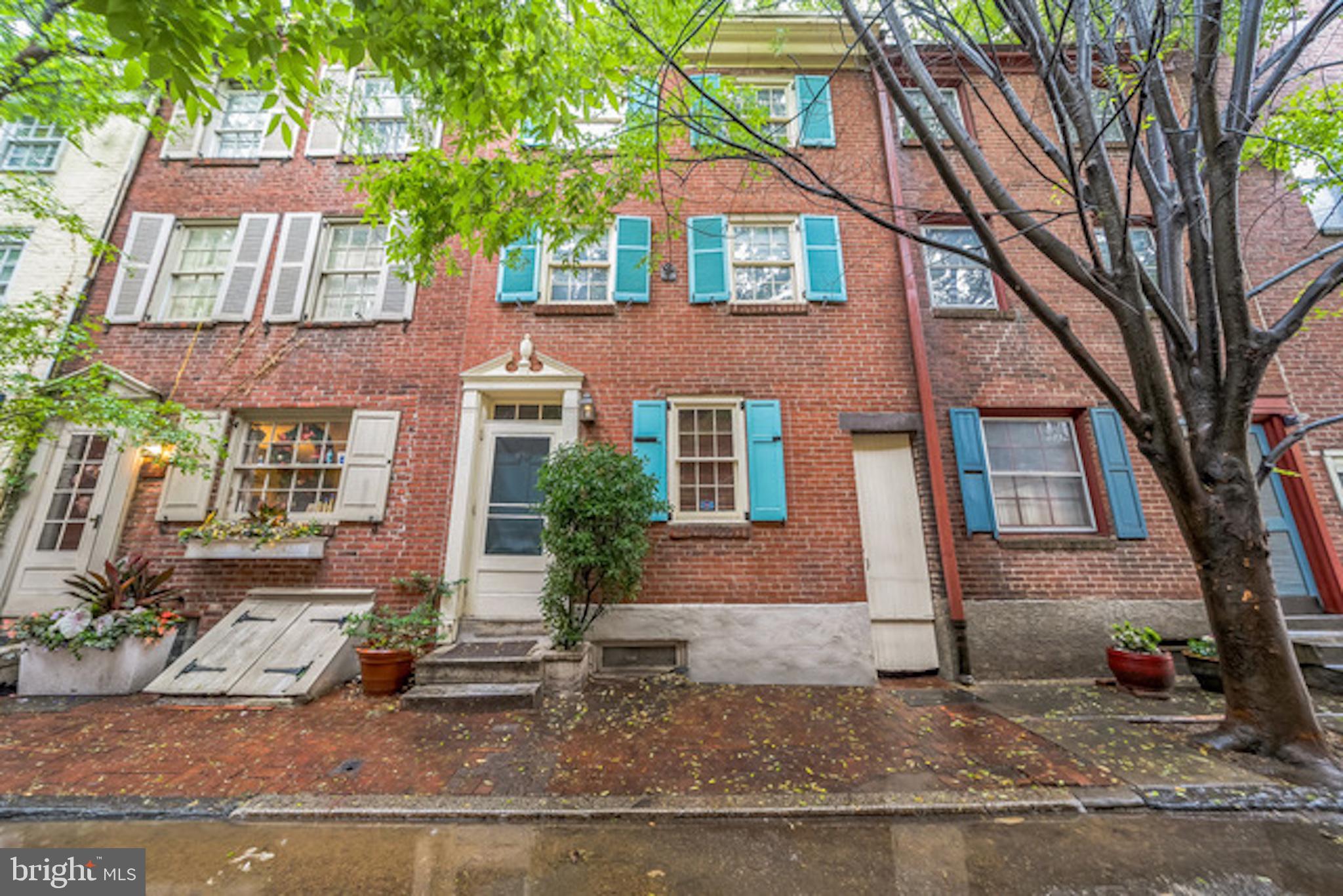 GARAGE PARKING & ROOFDECK! Impeccably renovated 2BD/2BA home in the heart of Washington Square West, blending historic charm with modern luxury. Located on a quiet, tree-lined street, this stunning property features central air, dual heating systems, hardwood floors throughout, and a single garage parking space.
The main level includes a cozy living room with a working fireplace and a kitchen outfitted with stainless steel appliances, gas stove, dishwasher and refrigerator/freezer.
The second floor offers a spacious bedroom with hardwood flooring, a custom California closet, and a marble bathroom with a tub/shower combo. The third floor features a sunlit bedroom with gallery ceiling lighting, a custom storage nook, and a walk-in California closet. The luxurious bath includes an oversized yellow onyx walk-in shower with a triple shower system and a stunning floor-to-ceiling glass block wall.
A spiral staircase leads to the Trex rooftop deck with running water, electricity, and panoramic views—including Penn’s Landing fireworks. Additional highlights include a charming rear patio, full basement with washer/dryer and ample storage, and a centrally monitored fire and security system.
Conveniently located near PATCO, SEPTA, Jefferson, Pennsylvania, and Wills Eye Hospitals. A rare opportunity to own a turn-key home with garage parking in one of Philly’s most desirable neighborhoods.