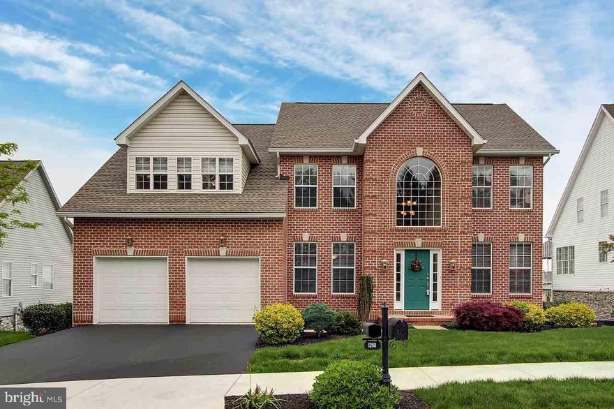 Stunning Colonial in gated golf community of Regents Glen. Spacious open floor plan w/beautiful architectural windows that provide lots of natural light. HDWD flr's, recessed lighting throughout, 2 story FR w/gas fireplace, kitchen w/granite counters & stainless steal appliances, lg MBR Ste + plenty of room to expand in the walk out basement w/rough-in for full bath. Enjoy entertaining on the maintenance free deck & covered patio.