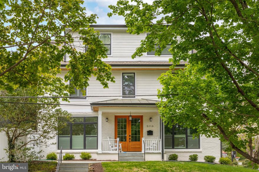 The Best Buy in Bethesda!  Stunning 2021 custom renovation on a corner lot in sought-after Glen Mar Park. This beautifully expanded 6BR/5.5BA home offers over 5,200 SF across four finished levels with refined finishes, dramatic lighting, and thoughtful design throughout. Soaring 9'+ ceilings and generous room sizes deliver space for both elegant entertaining and everyday comfort.

The gourmet kitchen features quartz countertops, top-tier stainless steel appliances, a six-burner range, and a custom island—open to both the dining and living rooms. The living area includes a modern linear fireplace flanked by built-ins, while the dining room and private office round out the main level. A large deck off the main floor is perfect for al fresco dining.

Upstairs, the expansive primary suite includes a walk-in custom closet and spa-style bath with soaking tub. Two additional bedrooms with en-suite baths and laundry complete this level. The third floor offers two more bedrooms, a full bath, recreation space, and storage. The fully finished lower level includes another recreation room, sixth bedroom, full bath, second laundry, and exterior access.

Additional features: front porch, fenced yard, driveway parking, and close proximity to parks, downtown Bethesda, and major transit. Located in the top-rated Whitman/Pyle/Wood Acres school district.