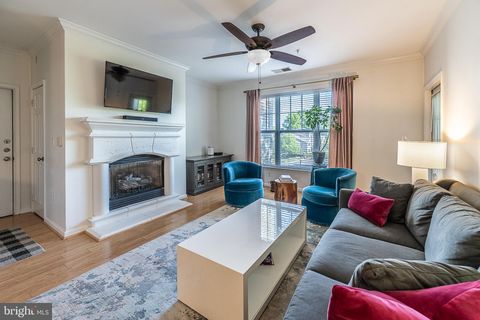 Photo of 12100 Garden Grove Circle #303, FAIRFAX, VA 22030 (MLS # VAFX2307394)