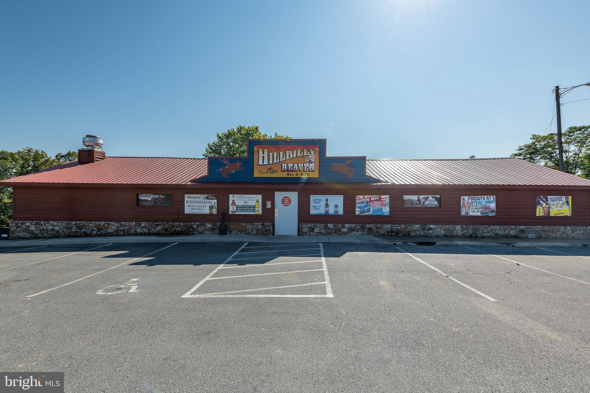 Ready for a New Owner - This turnkey operation offers all the equipment you need to operate your own bar! This successful business has room for 247 people inside and unlimited space outside with 2nd bar and stage for live music. Approximately 4400 square feet of space for your business of choice! New owner will need to establish a liquor license and gaming license. Additional parking lot can be leased for 50+ years.