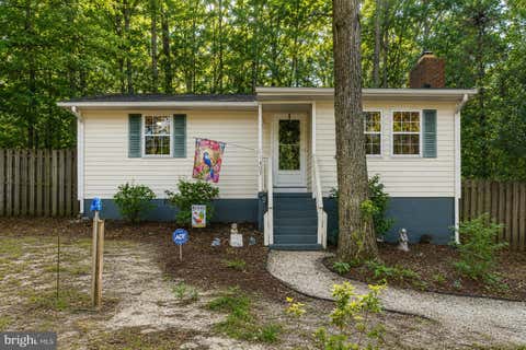 Photo of 11407 Rawhide Road, LUSBY, MD 20657 (MLS # MDCA2030182)