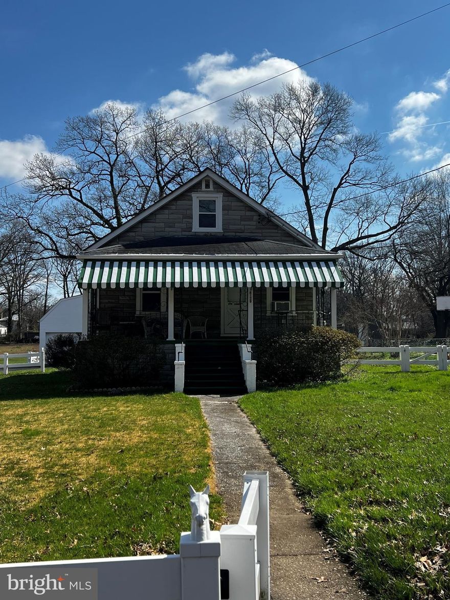 3 bedroom 1 1/2 baths. Detached two car garage with loft. Fenced in pasture and small barn.