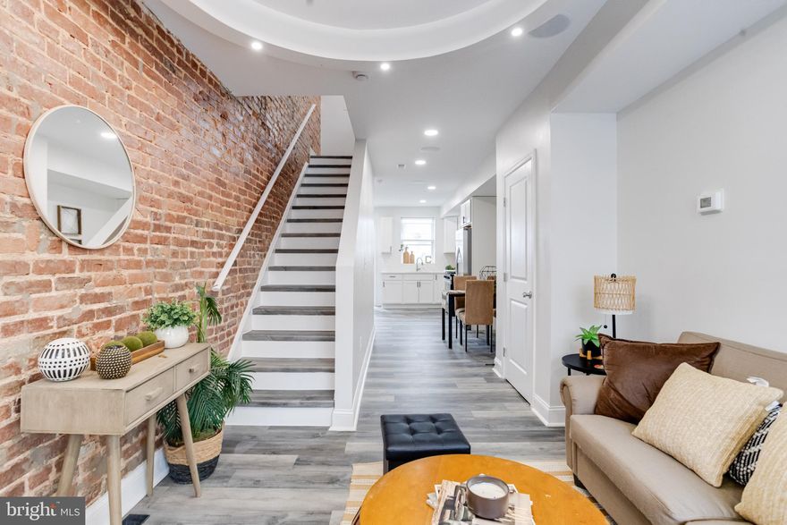 CUTE, COMFORTABLE, AND COZY IS THE BEST WAY TO DESCRIBE THIS 3 BEDROOM, 3.5 BATH, CONTEMPORARY ROWHOME. OWN FOR LESS THAN RENTING!! THIS TOTALLY RENOVATED PROPERTY OFFERS AN OPEN CONCEPT FLOOR PLAN WITH EXPOSED BRICK WALL, RECESSED LIGHTING, LV FLOORING, SS APPLIANCES, BUILT-IN STEREO SYSTEM, AND SO MUCH MORE. THIS PROPERTY IS CONVENIENTLY LOCATED NEAR SCHOOLS, SHOPPING, DOWNTOWN, PATTERSON PARK, AND JOHNS HOPKINS HOSPITAL. MAKE YOUR APPOINTMENT TODAY   EASY TO SEE!