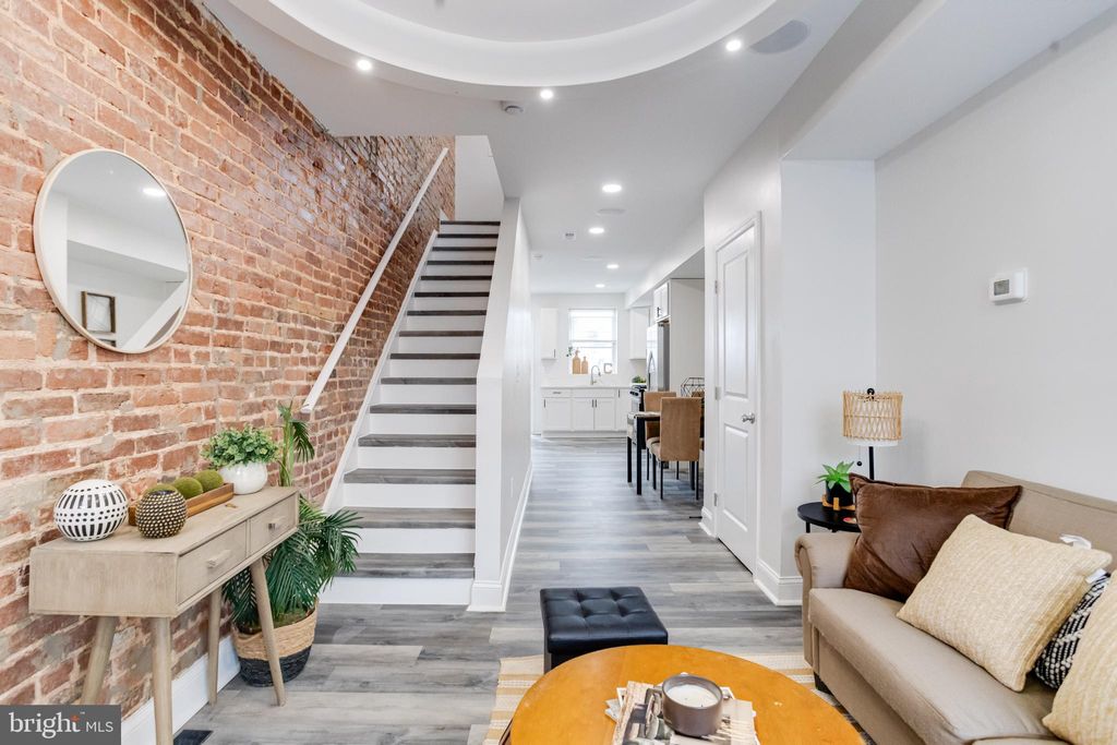 Photo of 315 N Robinson Street, BALTIMORE, MD 21224 (MLS # MDBA2199446)