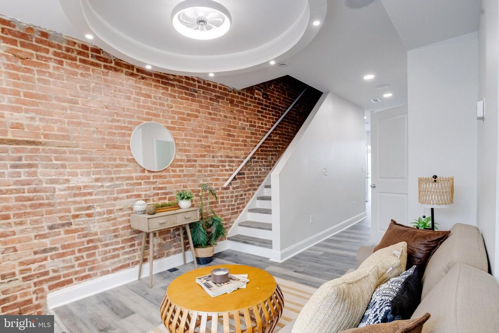 Photo of 315 N Robinson Street, BALTIMORE, MD 21224 (MLS # MDBA2199446)