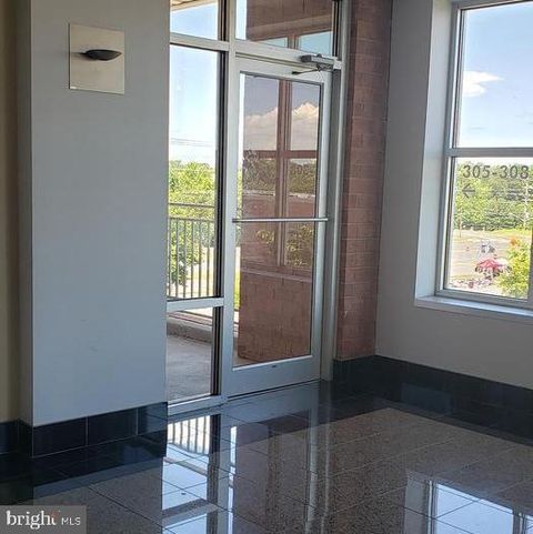 Photo of 14701 Lee Highway #305, CENTREVILLE, VA 20121 (MLS # VAFX2296652)