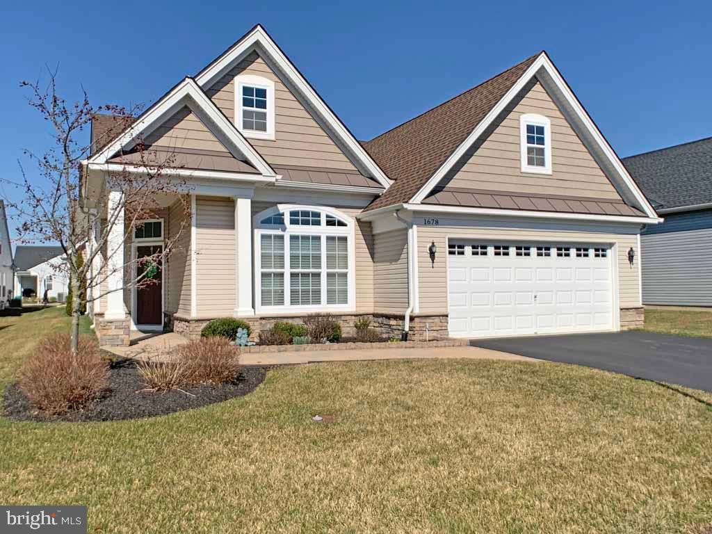 Live like you are on vacation  every day.  Exceptional Norwich model single story home located in a premier active adult community.   Walk into a lovely Living Room and Dining Room.  The house features a Master Bedroom with an amazing walk in closet (custom built-ins) and beautifully appointed Master Bath. Additionally, there is a second Bedroom and Hall (full/tub-shower)Bath,  expanded Family Room with fireplace,  upgraded gourmet kitchen with pantry with large breakfast area. Expanded Garage with a walk up staircase leading to a second level large storage area.   Beautiful patio off the family room makes for easy entertaining.   As if the home on itself is not enough the amenities in this community consist of 12,000+ clubhouse featuring indoor and outdoor pools, tennis courts, workout facilities, saunas, locker rooms and exciting social events and activities.  Year round enjoyment!!  This is a must see!