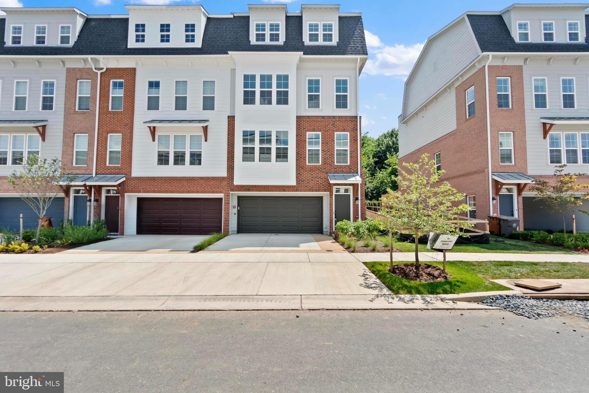Welcome to this stunning, Brand-New Lillian Corner Model by EYA in the Vibrant Farmstead District of Rockville! Never been lived in with over $233k of additional options! Great privacy backing to woods, beautiful landscaping, and the preserves. Just completed and move-in ready, this sun-filled, four-level corner townhouse offers a rare blend of luxury, versatility, and premium upgrades. Located in the highly sought-after Farmstead District, steps from Shady Grove Metro and King Farm retail, this home is designed for modern living at its finest.
Highlights Include:
3 Bedrooms | 4.5 Bathrooms | Elevator | Rooftop Deck | Home Office/Den/Guest Suite
Premium Upgrades Totaling Over $233K and All Included in the Price
This exceptional home features:
🌟 Main Living Level (2nd Floor):
A gourmet eat-in kitchen with an oversized Eternal Calacatta Gold quartz island, upgraded high-end stainless steel appliances, and plenty of cabinetry. The open floor plan includes a spacious living room with gas fireplace ($10K upgrade) and a large separate dining area, ideal for gatherings and everyday comfort.
🛌 3rd Level Retreat:
The primary suite offers a spa-inspired ensuite bathroom with designer mirrors, a walk-in tiled shower, and an expansive walk-in closet. A second bedroom with its own ensuite bath and a convenient upstairs laundry room complete this level.
🌇 4th Level Loft & Rooftop Deck ($79K Option):
Perfect for guests or entertainment, this level includes a full bedroom and bath, a media/bonus room, and access to the private rooftop deck — an ideal spot for relaxing or hosting under the stars.
🚪 Entry Level:
Features a flexible den/office or guest suite with a full bath, offering great privacy and function. A private, finished 2-car side-by-side garage, plus 2 additional driveway spaces, provide ample parking.
🛗 Age in Place with a high end Elevator ($65.3K) which seamlessly connects you to all four levels.
🌳 Enjoy gorgeous tree-lined views from both inside the house and from your private roof deck terrace and take full advantage of the Farmstead HOA amenities, including:
The Barn Community Center with Fitness Room
Outdoor Pool Area with Fire Pits and Lounge Seating
Playground & 1.25 Acres of Walking Trails
All Landscaping Maintenance Included
With luxury vinyl plank flooring, LED recessed lighting on every level, and designer upgrades throughout, this home is truly turn-key.
📍 Location Perks:
Moments from Mattie Stepanek Park, King Farm shops & dining, and easy access to major routes and minutes to the Shady Grove Metro.
Don't miss your chance to own this one-of-a-kind corner townhouse—schedule your private tour today!
Home Inspections are Welcome!
Available Now. A Must-See!