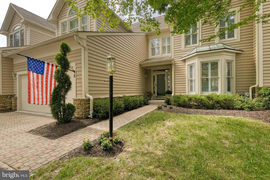 Located in the coveted community of Pebblecreek, this exquisite four-bedroom, three full and one-half-bath townhome awaits your arrival. With a spacious two-car garage and over 4,000 square feet of luxurious living space, this residence epitomizes comfort and sophistication. As you step inside, you'll be captivated by the sheer perfection that defines every corner of this home. Wide plank oak hardwood floors guide your way, seamlessly through the grand entryway and living and dining areas. Custom molding, trim, and millwork grace every room, exuding timeless elegance. The European-style kitchen is a culinary masterpiece, featuring stone flooring, marble counters, a center island, and pristine white cabinets. A charming breakfast area completes the kitchen, providing the perfect spot for morning coffee or casual dining. Flowing seamlessly from the kitchen is the two-story, light-filled family room with a gas fireplace. It’s ideal for effortless entertaining or relaxation. Ascending to the upper level, you'll find the owner’s retreat with a cathedral ceiling that adds an air of grandeur. The en-suite bathroom is a work of art, thoughtfully designed to exude luxury and comfort. Two additional bedrooms and a full bathroom complete this level, ensuring ample accommodation for family and guests. The finished lower level has been carefully designed to provide even more space for living and entertaining with a custom bar area; large family room; recreation space and an additional bedroom and full bath. Outside, appreciate the beautifully landscaped rear yard and a paver patio. An exceptional location for shopping, dining, and entertainment, you’ll never be far from the action. Your dream home in Pebblecreek is ready to welcome you with open arms. Schedule your showing today.