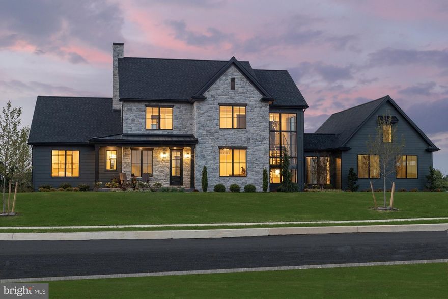 Come see the Roland Builder Inc model featured in the Harrisburg Parade of Homes. Roland Builder's custom floor plan with the most up-to-date features and amenities representing the very best quality and craftsmanship clients have come to expect from Roland Builder, Inc. This home has over 5,000 square feet of luxury with 5 Bedrooms, 5 1/2 Baths, 3-car garage and is positioned to maximize gorgeous views of the surrounding valley and golf course. Discover the abundance of luxury as you walk onto the front porch and for the first time walk into the foyer. To the right is the study perfect for anyone working from home with custom built-ins and a large walk-in closet with wainscoting.  To the left is the guest suite with full bath and walk in closet.  Once out of the Foyer you will enter the dining room and kitchen which leads to the luxurious great room which has an abundance of windows from floor to ceiling giving you endless amounts of natural light.  The floor to ceiling stone fireplace is a focal point all the way up to the cathedral ceiling.  The Custom appointment ship and superb detail alone is eye catching and evident through-out.  Enjoy the 1st floor living at its finest w/modern open floor plan featuring the custom kitchen with hardwood flooring, high-end appliances, walk-in pantry and a large island for entertaining.  Attached to the kitchen is the oversized mudroom featuring a walk-in closet, half bath, and lockers with cubbies for coats, hats and backpacks. The modern staircase is also located in the mudroom and features custom iron railing, open risers and a wall of stone, 3-stories.  At the top of the steps is the 2nd floor laundry room conveniently positioned just outside the bedrooms.  The Owners Suite features a tray ceiling, 2 walk in closets, and Owners bathroom with Pedestal tub, walk-in ceramic shower,  and double sinks.  The 2nd & 3rd bedrooms each having their own tray ceiling, walk-in-closet and full bath.  The lower level is also finished with an additional 1,500 sq feet of livable space having a family room, full bath and 5th bedroom. Other features include:   ½” engineered, white oak flooring, stone flooring and porcelain tile, dual zone HVAC, oversized 3-car garage with unfinished bonus room over garage with stair access, central vacuum system and under-floor heating in the breezeway. You will truly love entertaining and welcoming your guests to your fabulous home.  And YES, must see to truly appreciate.