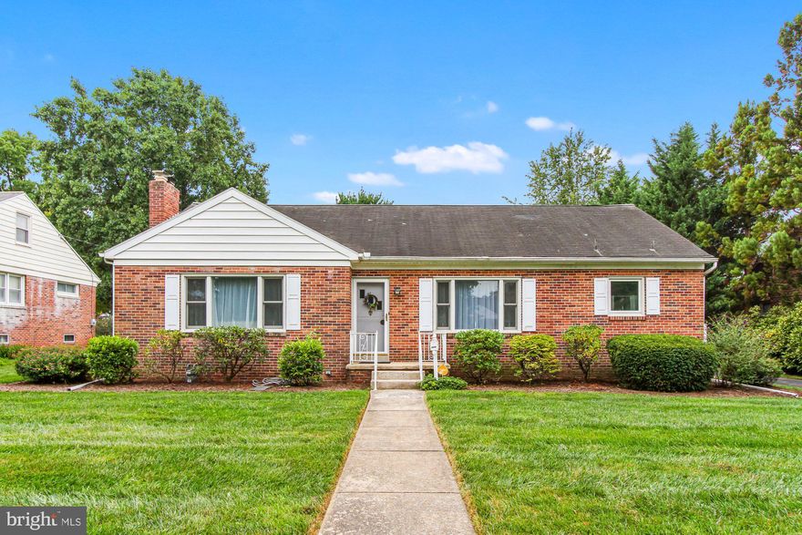 Great location near shopping is where you will find this solid brick home.  Livingroom with a fireplace, 3 bedrooms, 2 baths plus a nice lot with a detached 2 car garage.