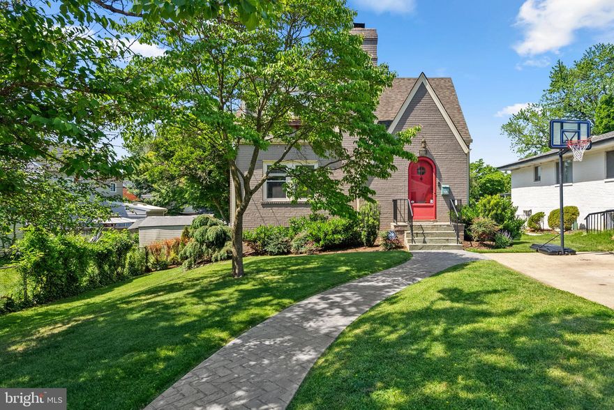 Welcome to 9504 Biltmore Drive, a beautifully expanded Tudor-style home nestled in the heart of sought after Indian Spring. Blending timeless character with thoughtful modern updates, this 4 bedroom, 3.5 bath home offers warm architectural details, generous living spaces, and a true primary suite retreat.

The fantastic updated kitchen with a large center island opens seamlessly to the spacious family room, creating the perfect layout for everyday living and entertaining. Just beyond, the deck overlooks the beautifully landscaped backyard featuring a hot tub, firepit area, and plenty of grassy space for gatherings, play, or relaxing outdoors. The walkout lower level provides easy access to the backyard and additional flexible living space with tile floors throughout.

The sun filled living room features a charming woodburning fireplace, while the main level also includes a bedroom and renovated full bathroom, ideal for guests or a home office setup. Hardwood floors run throughout both the main and upper levels, adding warmth and character to the home. Upstairs, you will find three bedrooms and two fully renovated bathrooms, including a true primary suite with double sinks, a walk in closet, and a beautifully updated en suite bathroom.

Additional highlights include a private driveway for off street parking and an ideal location just minutes from downtown Silver Spring, Sligo Creek trails, parks, restaurants, and Metro access. This exceptional home offers the perfect blend of charm, comfort, and convenience.