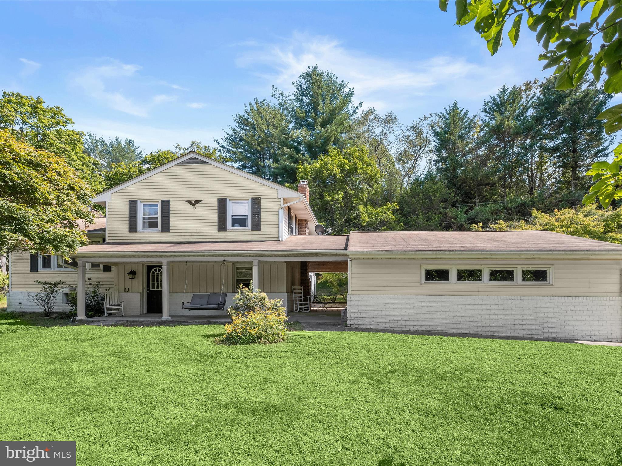 ** Located by Gunpowder Falls State Park sections A & B ** Tucked away on over 2.5 acres of tranquil countryside in Parkton, Maryland, 17515 Masemore Road offers a rare blend of privacy, charm, and modern comfort. This beautifully maintained 4-bedroom, 1.5-bath, 1,698 square foot home features an inviting open floor plan with gleaming hardwood floors, recessed lighting, and large windows that fill the space with natural light. The thoughtfully designed kitchen flows effortlessly into the dining and living areas, creating a perfect space for everyday living or entertaining. A cozy wood-burning stove adds warmth and character, while central A/C and ceiling fans ensure year-round comfort. The home’s exterior combines timeless brick with updated vinyl siding, and the asphalt roof adds both durability and curb appeal. Car enthusiasts and hobbyists will appreciate the expansive three-car garage setup, including a side-entry garage and detached space for added storage or workspace. Located in the highly sought-after Hereford school district and surrounded by peaceful landscapes, this property offers the perfect opportunity to enjoy quiet country living just minutes from major commuter routes.