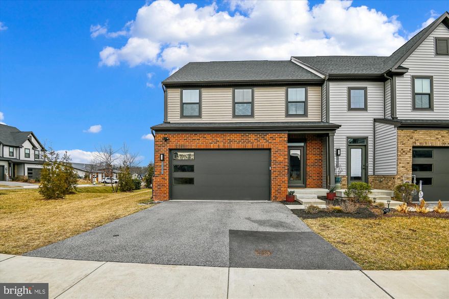 VA Assumable Loan with attractive 2.75% interest rate to VA Buyer.  Rare Opportunity in a Sought-After 55+ Water-Oriented Community!This like-new end-of-group Griffin Hall model offers exceptional space, style, and flexibility across three finished levels—plus the added bonus of a VA assumable loan for qualified buyers. Designed for comfort and convenience, the main-level primary suite provides true one-level living, while the upper level features three additional bedrooms, a full bath, and a versatile loft area—perfect for guests, hobbies, or a home office. The finished walk-out basement expands your living space with a full bath, ideal for entertaining or extended stays.  Enjoy modern finishes throughout, a rear deck for outdoor relaxation, and the privacy of an end-unit location. A two-car garage and low-maintenance lifestyle complete the package in this highly desirable, water-oriented 55+ community.
Homes like this—especially with an assumable VA loan—are rarely available. Don’t miss it!