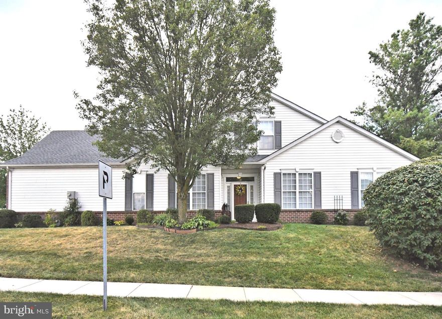 Lovingly maintained and improved end unit townhome in the highly desired 55+ community of Village at Newbury. The welcoming entry foyer features fine millwork with wainscoting and upgraded moldings, transom window, two closets, hardwood floors and a half wall with column overlooking the great room. The dining room boasts a large twin window, crown & chair moldings and adjoins the spacious living room with vaulted ceiling, ceiling fan, replacement twin window and outside entrance to the private rear patio with retractable awning. A large twin window in the breakfast room affords a bright and sunny eat-in kitchen with an abundance of raised panel cathedral top cabinetry, recessed lighting. ceramic tile back splash, upgraded millwork, replacement kitchen sink, KitchenAid SS dishwasher, GE SS microwave, refrigerator and gas range. The main bedroom features a vaulted ceiling with ceiling fan, two single windows, a large walk-in closet plus a double closet, private full bath with twin vanities, newer elevated commode, linen closet and walk-in shower. The 2nd bedroom has a sunny twin window, spacious closet and access to the full hall bath with vanity, replacement elevated commode and shower over the bathtub. Completing the main level (which affords true 1st floor living) is a conveniently located laundry room with access to the 2-car garage with an electric opener. The second floor is highlighted by a 20' loft with twin window, ceiling fan and wall to wall carpeting. There is also a separate finished craft room with access to the HVAC systems and additional attic storage. Additional features include a new roof (2024), replacement gas HW heater with alarm (2021), Baldwin brass accent switch plates and mature foundation landscaping. Conveniently located to shopping and many restaurants. Come experience this wonderfully bright home that only an end unit can offer. Put this on your must-see list!