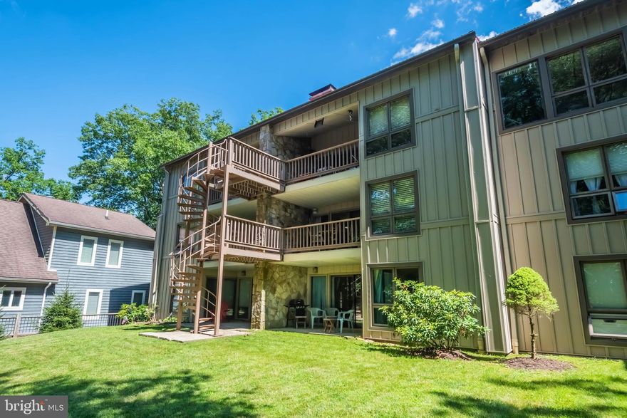 2+BR, 2BA waterfront condo at Red Run offering lake views and assigned deep water boat slip!  Recently awarded 'top 1% of all homes on  Airbnb'! Immaculately maintained, the owners have remodeled the entire unit in the last year. Luxurious and well-appointed with upscale furnishings & contents - conveys essentially TURNKEY. Gorgeous master suite with lake views, spacious bedrooms, wood burning fireplace, lakeside balcony and additional outdoor storage, as well. Red Run offers nearly 11 acres of common area and rare amenities like a heated swimming pool, tennis courts, paved parking, playground, fire pit & plenty of space to spread out for picnics . Coveted deep water cove with a private, woodsy feel. Privately managed vacation rental with impressive reviews and impressive bookings.