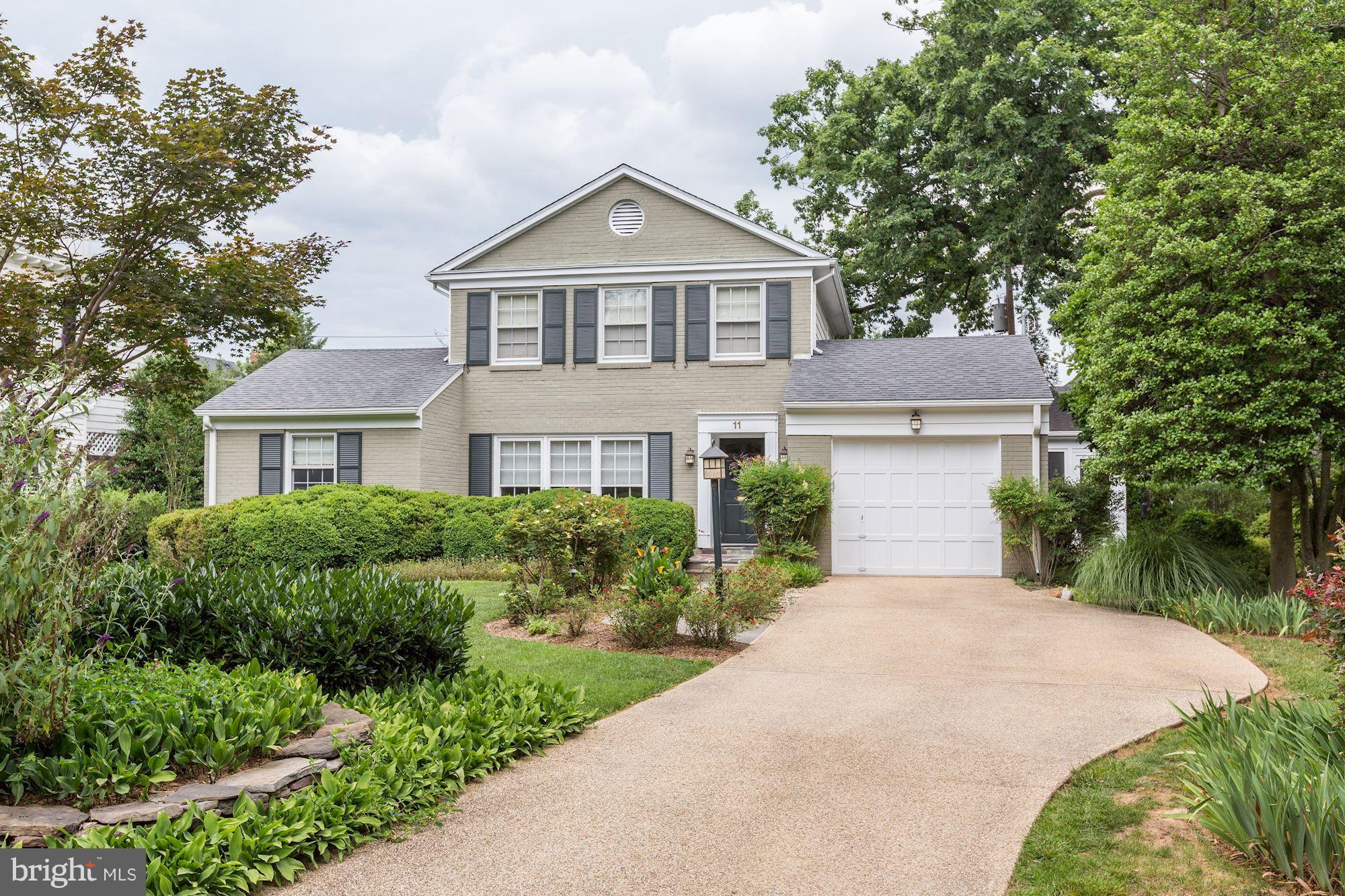 Chevy Chase Village Charmer! Kitchen family room, large living room w fp, separate dining room, three levels. Four bedrooms and five full baths. One car attached garage. Lower level recreation room. Lovely garden.