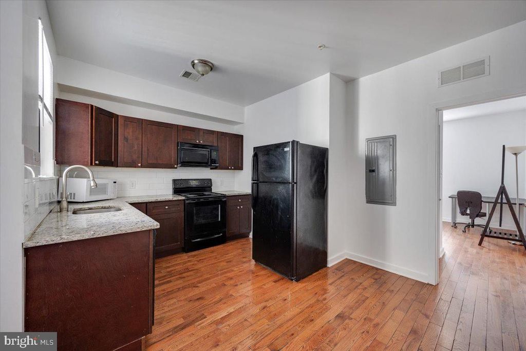 Photo of 1322 N 15th Street #UNIT A, PHILADELPHIA, PA 19121 (MLS # PAPH2551902)