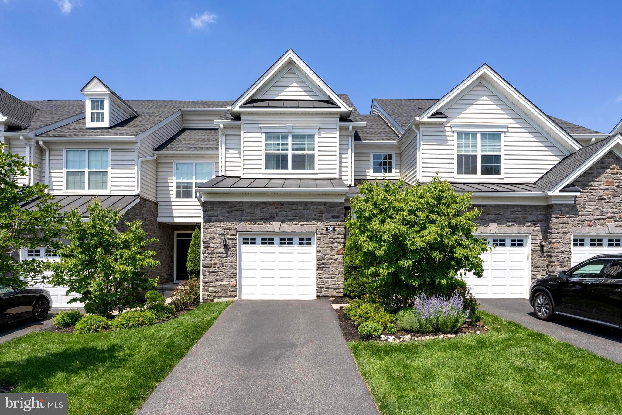 Welcome to a stunning and elegant 3-bedroom, 3.5-bath, 1st-floor main bedroom, finished walk-out basement with a full bath, situated in the highly sought-after Oaks at Lafayette Hill community. Ready to Move in! This impressive 2,430 sq. ft. home seamlessly blends style, comfort, and convenience. Enter the foyer and instantly experience the spacious and inviting open floor plan, accentuated by Mannington engineered hardwood floors throughout the main floors and recessed lighting that seamlessly flows throughout. The open kitchen serves as the heart of the home, showcasing impressive 42-inch cabinetry, a stylish tile backsplash, and elegantly rounded-edge granite countertops that enhance its appeal. The spacious center island, complete with a granite top, provides ample prep space and features a double-bowl sink that enhances both functionality and seating options. The adjacent great room boasts ample space for gatherings with loved ones, complete with sliding glass doors that extend to a composite deck, perfect for entertaining, enjoying a peaceful moment, or grilling outdoors. The dining area is flooded with natural light, making it an ideal setting for both casual meals and elegant dinner parties. 1st floor primary suite, boasting a walk-in closet, recessed lighting, crown molding, and large windows that flood the space with natural light. The ensuite primary bath features a stylish 12x12 tiled floor, a double vanity, a walk-in shower, and a convenient linen closet. The main level features a laundry room for ultimate convenience, complemented by a conveniently placed powder room and a practical coat closet. The impressive hardwood stairs lead to the upper level, which offers a view of the main level area. The versatile upper open loft area is perfect for an office space, a creative art studio, or even a piano nook. Two generously sized bedrooms offer ample closet space, while the full hall bath features a double vanity and a convenient, practical shower/tub combination. The finished walk-out basement with full bath offers versatile living spaces that can be used as a spacious family room or a flexible bonus room, perfect for a media or game room, playroom, home office, in-law suite, or gym. This home offers a convenient location with easy access to major highways, including 76, 476, 309, and 202, as well as the PA Turnpike, beautiful parks, and the vibrant local scene in downtown Conshohocken. Don’t miss your chance to own this beautiful home in a highly desirable neighborhood! Move-in condition! Easy to Show!