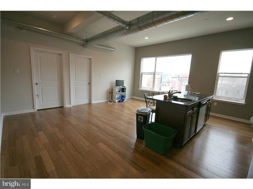 Available Now: Unit #9 is a 3BD/2BA unit located on the 3rd floor of a multi-unit building with modern updates throughout, including hardwood floors, spiral ductwork, mosaic tile backsplash, high ceilings and a front-loading washer/dryer in unit for ultra convenience. The open floor plan living and kitchen area are perfect for entertaining and the kitchen island provides additional seating or prep space. The room is large enough to allow for a variety of different setups and to have a dining space as well. First full bathroom is off of this main living space and the second full bathroom is attached to one of the bedrooms.   Kitchen has granite countertops, stainless steel appliances (gas range stove, microwave, refrigerator, dishwasher and garbage disposal) lots of cabinet space plus an additional pantry closet for extra storage. All three bedrooms are about equally sized, although one has the en-suite bathroom.  1509-11 W Girard Ave is a newly constructed building which is professionally managed by JG Real Estate, has resident-only parking available, an elevator and well-kept & cleaned common areas. You will be able to pay your rent/submit maintenance requests directly online, have a 24/7 emergency maintenance hotline, and receive professional and courteous service from the property management staff. There is garage parking available directly underneath the building for $50/month.  Located just off of Broad & Girard, this building is extremely convenient to public transportation as you can walk a half block to the Broad Street Subway Line or to multiple trolley stops on Girard Ave. Close to Temple University, Fairmount/Art Museum areas.  First month, last month, one month security deposit due at lease signing. $65 move-in fee. $45 application fee per applicant. Pets are conditional on owner's approval and will require additional deposit, if accepted. Tenants responsible for electricity, gas, cable/Internet. Water is included in the rent.