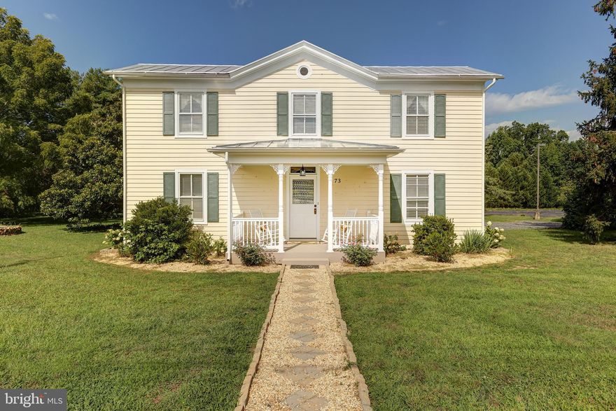 Straight from the pages of Southern Living Magazine, this historic, recently-renovated colonial home comes with a short term rental history!  Nestled into charming Mineral, Virginia, the curb appeal of this 2,000+ square foot, meticulously-maintained home is out of this world!  People love the hardscaping brick that leads you to the front door, the soft yellow painted exterior siding, the shade offered by the inviting covered front porch with composite decking, and the massive sprawling deck with custom bench out back.  Inside, the beautifully finished hardwood flooring will catch your eye immediately.  The first floor offers a spacious bedroom with ceiling fan and closet, full bath with black and white tile floors, relaxing sitting room/den with ceiling fan, and a beautifully-renovated kitchen with stone countertops, spacious white cabinetry, large peninsula with bar seating, lovely white appliances, double wall oven, and exquisite crown molding.   The first floor also includes a formal dining room with crown molding, chandelier, and historic fireplace mantle.  Beautiful wood hand railing and white trim lead up the staircase to the second level, where there are three additional bedrooms: a primary bedroom with en suite bathroom, tile flooring and separate shower; two additional  large guest rooms, and a beautiful full bath with tub and tile, all on the second level.  Upstairs also provides a laundry closet, with washer and dryer.   Out back there is a convenient matching storage shed, great for lawn equipment or storage boxes.   Furniture can convey with appropriate offer or negotiated on side.  Seller has used home as a short term rental and earned approximately $11,000 in gross rental income thus far in 2023.  Great location in the heart of historic Mineral,  just 5 minutes to Lake Anna, and less than 10 minutes from the town of Louisa.   Nearby you'll find restaurants, groceries, gas stations, hardware stores, parks, barber, salons, schools and more. FREE MONEY!  Seller will give the buyer $4,000 for closing costs OR to buy-down the buyer's interest rate 1% for a year, which will reduce your monthly payment by approximately $250 per month!