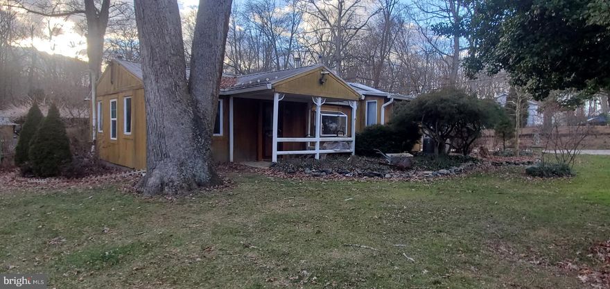 Welcome to 143 Shady Beach!  This home is a 2 bed 1 bath home located on a gorgeous lot with almost 2 acres of fenced in property!  Located minutes from the Town of North East and a stones throw from local marinas, North East little league fields and more.  Pets are WELCOMED and having the entire property fenced in is a plus for dog lovers.  Beautifully landscaped gardens give the property color all year,  relax by the Coy pond or cool off in the above ground swimming pool.  Also featuring its own outdoor campsite!   This is a one of a kind rental and the owner is looking for someone to enjoy everything this property has to offer!