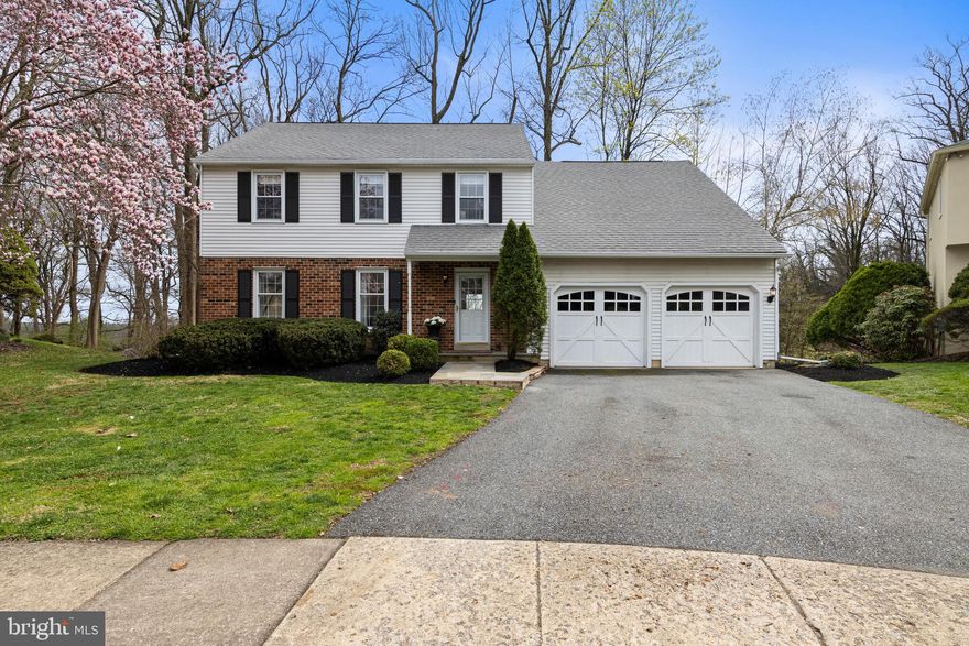 Discover the perfect blend of charm and walkability in this move-in-ready 4-bedroom, 2.1-bath Colonial with completely finished lower level, tucked into a cul-de-sac community, with open space dedicated to recreation just off South Devon Avenue. Situated in the #1 ranked Radnor School District, this location offers an inviting neighborhood of sidewalks encompassing Eaton Drive, Harrow Circle, and Scotch Lane. The home features loads of curb appeal with its front porch, classic brick-and-white-siding exterior with black shutters, and an attached 2-car garage.
The interior features gorgeous wood floors throughout the first floor. The floor plan flows from the foyer into the formal living and dining rooms—the latter finished with a chair rail and French doors. The brand new kitchen is a true highlight, featuring white cabinetry, quartz countertops, stainless steel GE Cafe' appliances, a white subway tile backsplash, and a coffee station with a microwave and additional cabinet and counter space. The kitchen opens to a sunny breakfast room with a large window. An adjoining family room is anchored by a fireplace, a large, deep-set bay window, and French doors leading to a large rear deck. A powder room completes the main floor.
The second floor features a primary suite with two closets and an ensuite bath with a walk-in shower with seemless shower door. Three additional bedrooms are served by a beautifully renovated hall bath featuring a marble double-sink vanity, beautiful tile floors, and a skylight. 

The full, finished walk-out lower level adds approximately 1,000 square feet of versatile space with recessed lighting and durable LPV flooring, perfect for a playroom and exercise room.
Outside, the large rear deck overlooks trees, offering privacy and a quiet retreat just a short stroll from local parks and the boutiques, cafes, and dining of Downtown Wayne. Walkable to the Radnor trail and Ideally located just .3 miles to Wayne Elementary and .5 miles to the Wayne Train Station with direct service to Philadelphia and NYC. This is a wonderful opportunity to move into a great neighborhood in the Radnor School District and enjoy a charming home with thoughtful recent updates in a premier West Wayne location.   *******Showings start Thursday 4pm-6pm **********