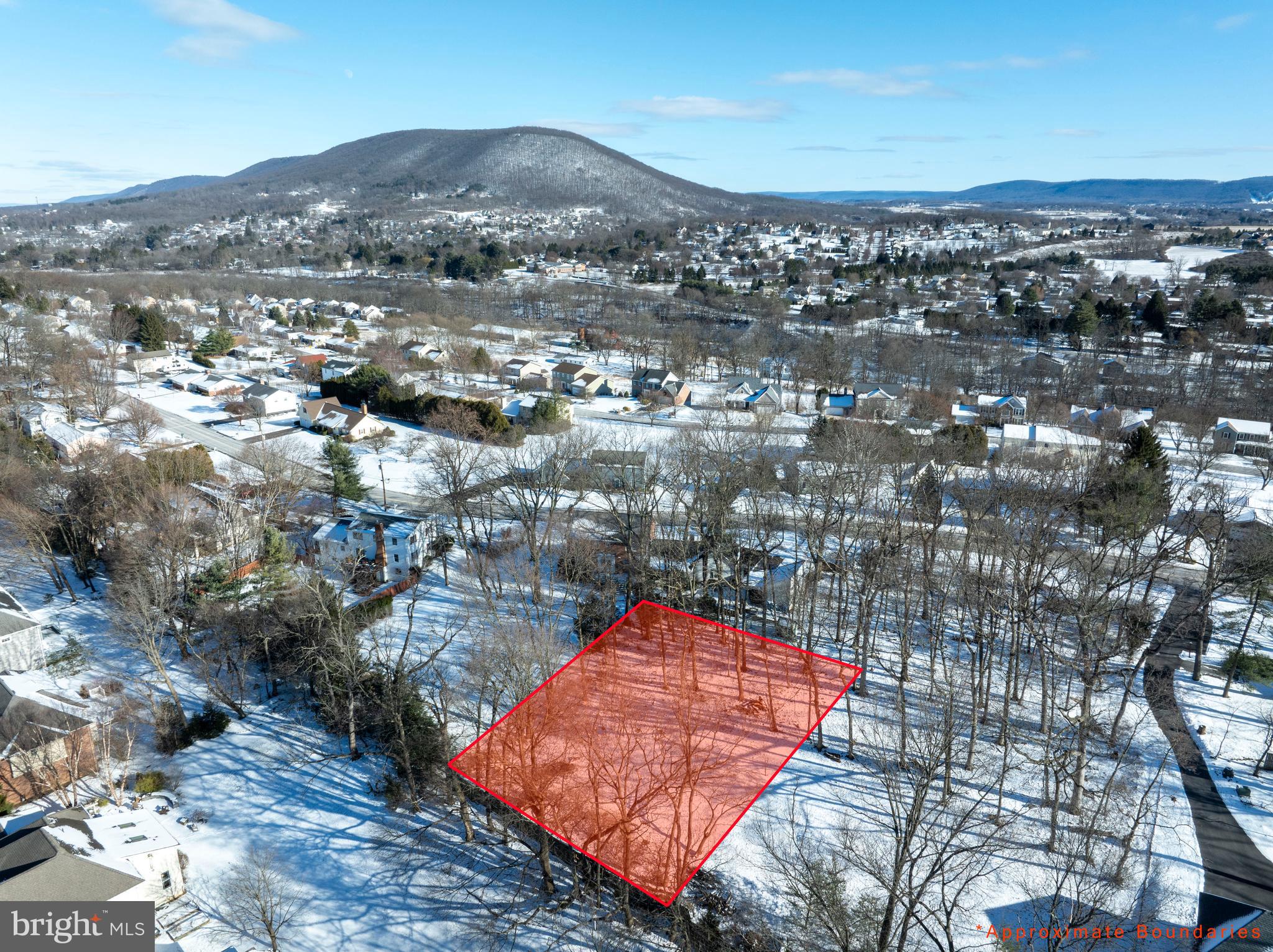 One of a kind beautiful, wooded building lot located in the established Centre Hills Village and State College School District. Public water and sewer available. Recorded shared access and utility access.