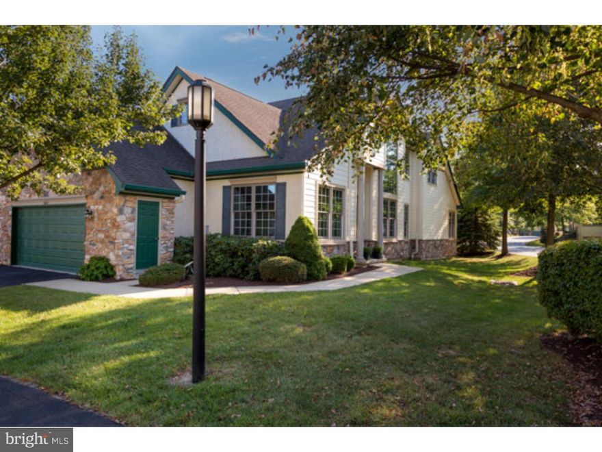 Enjoy a comfortable lifestyle in this spacious End Unit home featuring a first floor master suite.  Interior was just improved with fresh paint, new carpeting and an updated kitchen.  The open and airy floor plan has soaring ceilings, numerous upgrades and oversized windows.  This is the perfect home for gracious and casual entertaining.  Floor Plan - 1st:  Entrance foyer, open concept living and dining room, sophisticated kitchen with new stainless appliances and granite, opens to breakfast area and great room; Deck, Master suite with luxury bath and walk in closet; additional den/guest room with Full Bath.  A laundry room and attached two car garage are ideal.  2nd:  Loft, Two additional bedrooms, Full Bath, finished storage room or office.  Lower Level:  Fully finished recreation room, storage spaces.  Exterior has new Hardi Plank lap siding.  Gas Heating. This quiet end unit in Yardley Village is a desirable location.   Move to Hershey's Mill and delight in the easy lifestyle!