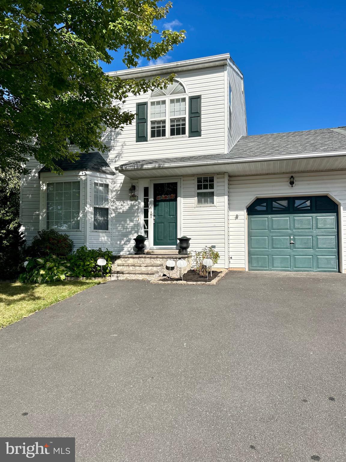 Welcome to this beautiful carriage home featuring three thoughtfully designed bedrooms and two and a half bathrooms, nestled within the esteemed Merion Community. This is strategically located in the celebrated Spring-Ford School District and offers a perfect blend of convenience, with Limerick Elementary just steps away. The moment you enter, you are greeted by an open-concept dining and kitchen area that epitomizes contemporary design, making it ideal for both intimate gatherings and grand entertaining. Enjoy preparing meals in the large kitchen with double sink, gas stove, built-in microwave, dishwasher, refrigerator and panty. You love the spacious dining room with chair rail, bump out window, and half-moon opening into the kitchen. The inviting living room, adorned with a charming wood-burning fireplace, exudes warmth and elegance, providing a cozy sanctuary on chilly evenings. Adjacent to the living space, a versatile bonus room with skylight and an electric fireplace, whether as a home office or a recreational retreat. Ascend the wide staircase to the second level, where you will find a spacious main bedroom through double doors, vaulted ceiling, ceiling fan, characterized by a generous walk-in closet and en-suite bathroom featuring tile flooring, double sink and a sumptuous walk-in tile shower. Further down the hallway, two additional spacious bedrooms provide comfortable accommodations for family or guests, complemented by a hall bath and an ample double hall closet. The expansive full basement offers unlimited potential for personalization—envision a home gym, office, or entertainment space tailored to your lifestyle. Flowing gracefully through sliding doors, the indoor living space transitions to an expansive deck, creating a serene outdoor oasis perfect for al fresco dining, leisure, and peaceful relaxation within the secluded and beautifully fenced backyard. Practicality and style converge with the inclusion of an attached garage and ample off-street parking, ensuring sufficient space for vehicles and storage. Recent upgrades enhance your peace of mind, including a new roof installed in 2018, a new HVAC system installed in 2022, and freshly laid plush carpeting throughout the residence in September, 2025. This distinguished home is ideally positioned for effortless access to major thoroughfares, facilitating delightful excursions to the Philadelphia Premium Outlets or Providence Town Center, where a wealth of shopping and dining experiences await.