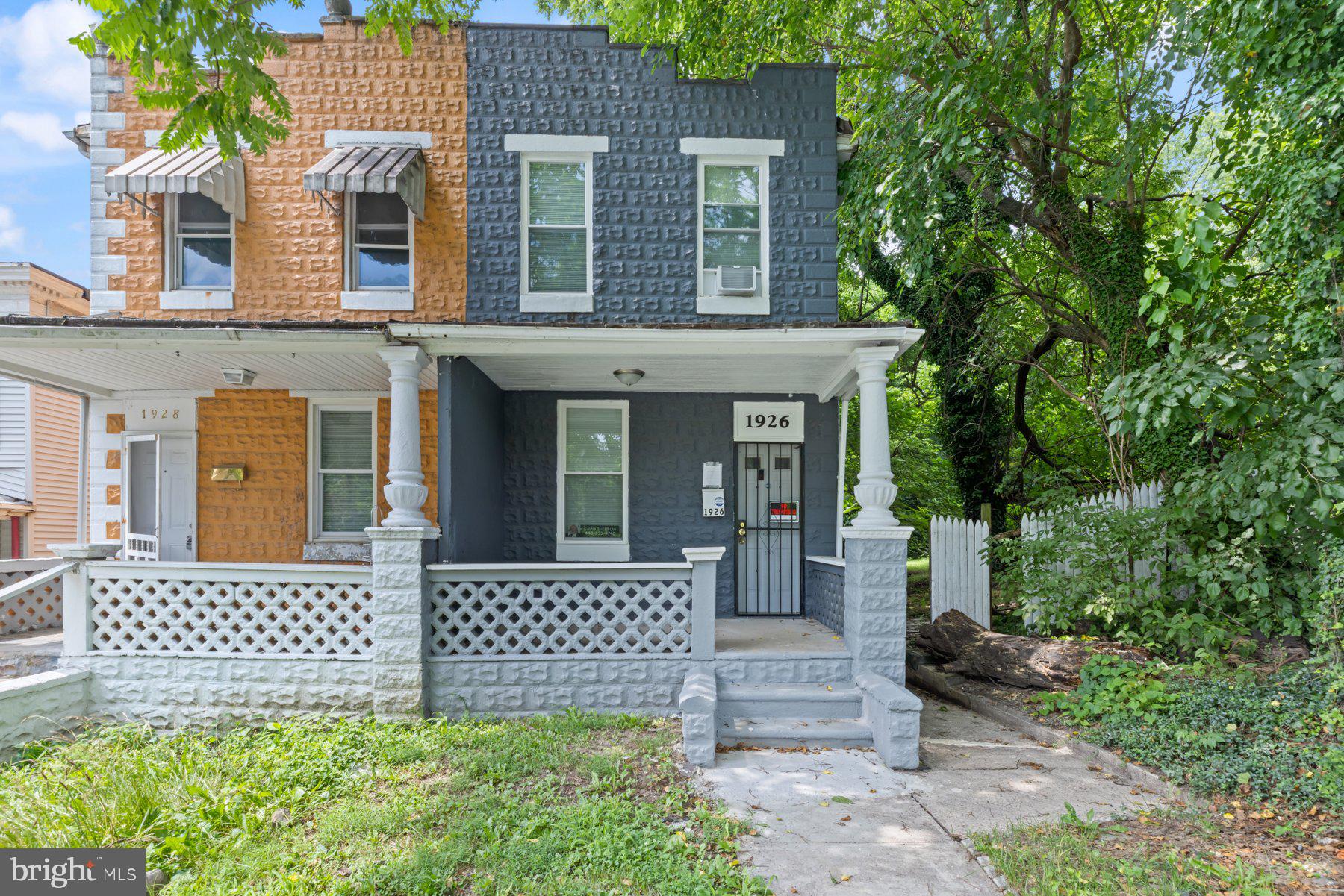 Newly refreshed 3BR/1.5BA semi-detached Townhome located on a tree-lined street in Morell Park. ake On a beautiful tree lined street, make your way to the covered front porch of a newly refreshed 3 BR, 1.5 BA semi-detached home. Step inside and be greeted by a place filled with natural light and tons of original character. Be wowed with the polished hardwood floors in the spacious living room and dining room. The open entry between the two rooms features columns bringing an elegant look to this already classic home. Walk past the stunning stairway into the newly remodeled kitchen boasting easy care flooring, plenty of cabinets, stainless and black appliances, granite countertops, a stainless steel sink, and room for a breakfast table. Original hardwood floors carry through to the second floor boasting a large primary bedroom, two sizable secondary bedrooms, and a newly remodeled full bath. The lower level is clean, dry, and unfinished giving you the opportunity to create additional living space to accommodate your family's needs, and offers a laundry, and a walk-out to the fenced yard. From the kitchen step outside a cozy covered deck that overlooks a yard filled with opportunities. This home is move-in ready with so much to offer new homeowners, and is located in close proximity to shopping, restaurants, and commuter routes.