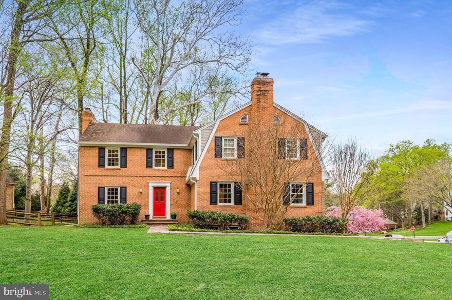 Welcome to 7500 Hackamore Drive, a beautiful brick colonial nestled in the highly sought-after neighborhood of River Falls in Potomac, Maryland. Boasting over 4,300 square feet of living space, this meticulously updated five-bedroom, three-and-a-half-bathroom home showcases a beautifully renovated kitchen, updated bathrooms and new deck and patio hardscape.

Step into the main foyer adorned with tile flooring. The hardwood floors flow seamlessly throughout the remainder of the main level. The inviting living room is abundant with natural light and hosts an elegant wood-burning fireplace. The dining room is a true showcase with its custom trim work and chair molding, adding an elegant touch to every meal.The heart of the home is the fully renovated kitchen that exudes modern sophistication. This kitchen was thoughtfully designed featuring top-of-the-line Bosch appliances, custom crisp white cabinetry, quartz countertops, and a convenient beverage refrigerator. A bay window wraps the eat-in area and offers access to the sunny upper level Trex deck. The adjacent family room is full of character with its wood beams, enclosed wet bar, wood-burning fireplace wrapped in brick and built-in cabinetry, providing ample space for both relaxation and a home office. A modern powder room and main level laundry room complete the main level for added convenience.

The upper level of the home is a haven for rest and relaxation, hosting five bedrooms and three renovated full bathrooms. The primary suite is a true retreat with its newly designed space, including built-in cabinetry and a spacious walk-in closet with custom shelving. The ensuite bathroom is elegantly designed with marble and designer tile, a walk-in shower, oversized tub and dual vanities, adding a touch of luxury to your everyday routine. Two bedrooms share a jack-and-jill bathroom, while the remaining two bedrooms share a well-appointed hall bathroom, providing comfort and convenience for family and guests alike.
The lower level offers additional living space for leisure and entertainment. With a cozy wood-burning fireplace wrapped in brick, a comfortable living area, and space for game tables, this level provides the perfect setting for lounging with family and friends. The walkout leads to the updated patio area and the nearby staircase leads to the new Trex deck. A convenient mudroom provides access to the attached two-car garage and ample storage space is not to be missed.

River Falls is an incredibly special community featuring a neighborhood clubhouse, swimming pool, tennis courts, playgrounds and fields. Enjoy everything this community has to offer, while also being in close proximity to Clara Barton Parkway and I-495. The endless trails and parkland surrounding this neighborhood can be enjoyed all year round. With its impeccable updates, spacious layout, and desirable location, 7500 Hackamore Drive is a place to call home. Come and experience Potomac living in this exquisite colonial residence.