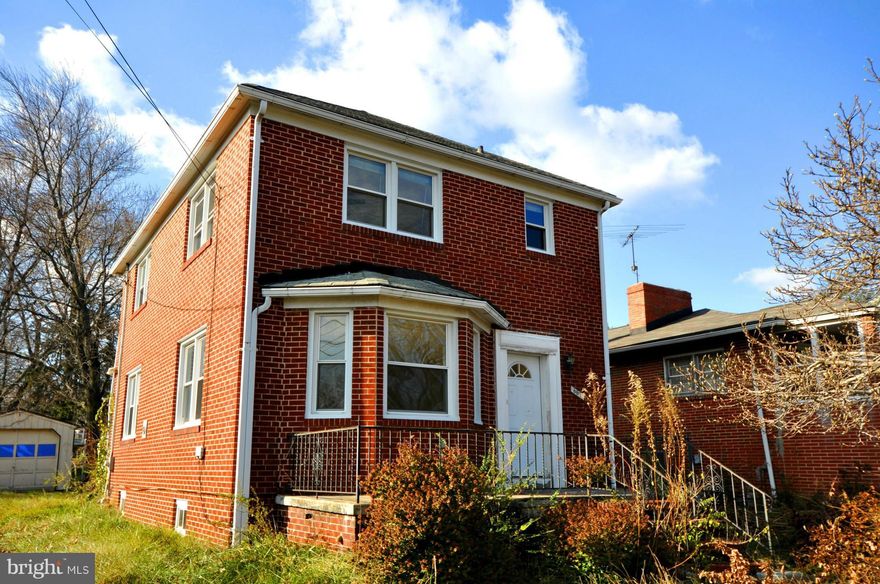 Blank slate for your dream home! Large living room with an arched doorway. Galley style kitchen with serving window into separate dining room. Huge basement for extra living and storage space. Some TLC is needed but this home can really shine with a little work!