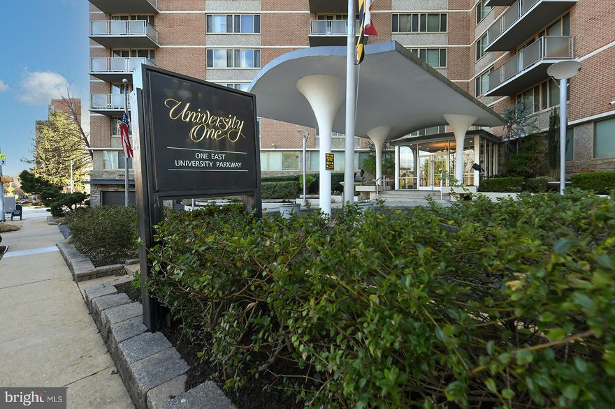 Welcome to 1 E University Pkwy Unit 1202, a spacious 2-bedroom, 2-bathroom condo with incredible views overlooking Guilford Park, perfectly located next to the Johns Hopkins University campus in the heart of Charles Village/Guilford.

This unit offers a rare opportunity to invest in a well-sized unit brimming with potential. With a bit of sweat equity, it’s the perfect blank canvas for either a savvy investor or an owner-occupant looking to add personal touches and build real value. Step inside to find a generous living space, with amazing views of Tuscany-Canterbury and Guilford Park. The kitchen is fully functional and ready for your vision, while both bedrooms offer ample space, with the primary suite featuring an en-suite bathroom.

This secure building features concierge services, key fob entry, and an array of amenities including a rooftop pool, a spacious lounge/rec area with a full kitchen for hosting, a fitness center, and a Smart Laundry Card System. Garage parking is available for lease at just $70/month. Located just steps from Johns Hopkins University, Union Memorial Hospital, and the greenery of Guilford Park, you’ll also enjoy easy access to the JHU shuttle, local restaurants, farmers’ markets, and shopping. While the property is being sold as-is, its location and layout make it a rare chance to customize a home in one of Baltimore’s most sought-after neighborhoods.

Don’t miss the opportunity to unlock the full potential of this gem. Schedule your showing today — your next investment to add to your portfolio