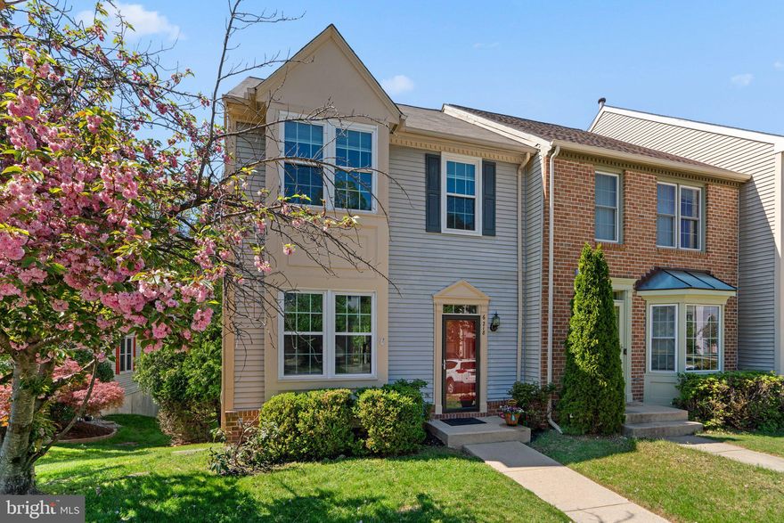 Nestled in a peaceful community, this end of group townhouse backs up to lush trees, providing you with a private oasis while still being close to shopping, Route 100, BWI, Marc Train Station, and Fort Meade.
As you step inside, you're greeted by a spacious living room and dining area adorned with gleaming hardwood floors. Freshly painted walls create an inviting atmosphere, perfect for entertaining family and friends or cozy nights in. Enjoy cooking in your updated eat-in kitchen, featuring stainless steel appliances, beautiful granite countertops, and a state-of-the-art induction oven and new dishwasher. Step outside to your private deck, an ideal space for summer barbecues or morning coffee surrounded by the beauty of nature. With the backdrop of towering trees, this outdoor area is your personal escape.This townhouse boasts three well-appointed bedrooms, each offering ample space and natural light. The primary bath features a separate soaking tub and shower, transforming your daily routine into a spa-like experience. There are  two additional full baths, one in the upper level and one in the basement as well as a half bath on the main level.The walk-out basement is an entertainer's dream, complete with a bonus room and a built-in desk, perfect for a home office or study area. Whether you need a playroom, a media center, or an additional guest space, this flexible area adapts to your lifestyle needs.Recent Upgrades are a new water heater (2024) and a furnace (2023), providing peace of mind and energy efficiency for years to come.Enjoy the comfort of a well-designed layout, and the serenity of nature right in your backyard.