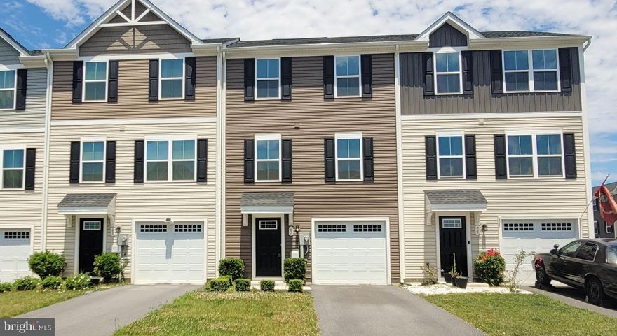 New lower price! Contact me or your agent to apply today. Discover the charm of this beautifully designed townhouse in The Lakes at Martinsburg. Built in 2021, this Colonial-style home offers a modern living experience with a fully finished basement and convenient garage access. Enjoy the included laundry on the same level as your bedrooms. The community offers sidewalks, a dog park, playground and gazebo. Excellent schools are within reach! Pets welcomed on a case-by-case basis.