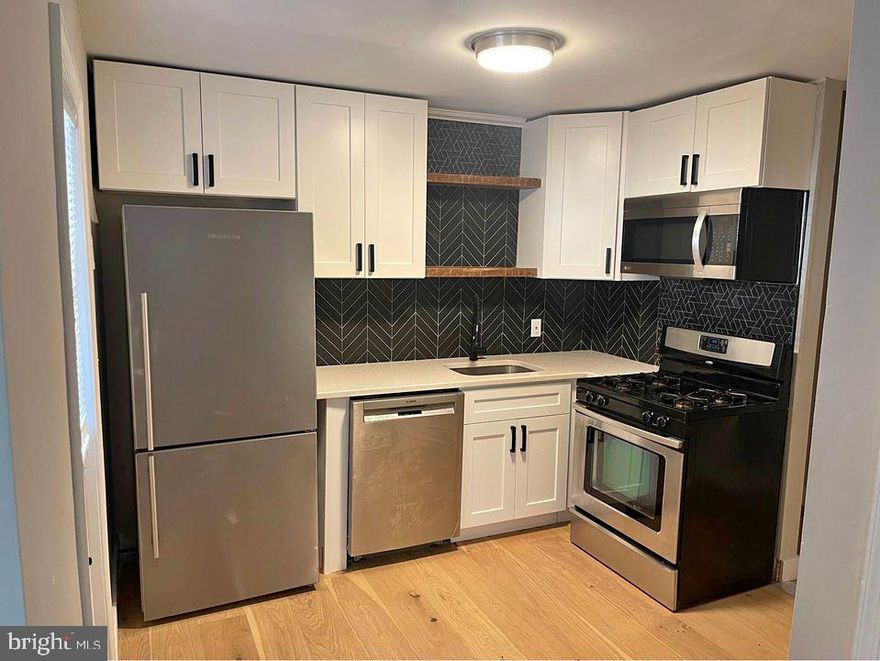 FRESHLY UPDATED 2ND FLOOR APARTMENT IN THE HEART OF FELLS POINT! Location, location, location! Walking distance to Harbor East, Downtown Baltimore, Johns Hopkins, and steps from Fells Point restaurants including Starbucks and shops!! Apartment features a spacious living room, updated kitchen w/ stainless steel appliances, 2 bedrooms, 1 full bath, & shared rear patio!