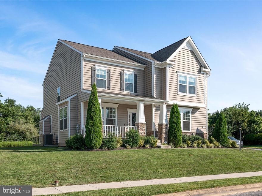 Welcome to 209 Klee Drive in Martinsburg Station! This move-in ready home perfectly blends elegance, comfort, and convenience. Ideally situated on a desirable corner lot, it's just steps away from community amenities like the clubhouse, pool, playground, and tennis courts.
Upon entering this charming colonial, you'll discover a versatile living room—ideal for a home office, playroom, or study. The family room, located off the kitchen, features a cozy propane fireplace, perfect for relaxing evenings. The open-concept kitchen boasts beautiful granite countertops, an island, abundant cabinetry, and stainless steel appliances—perfect for both daily meals and entertaining. The light-filled morning room offers a peaceful dining experience with views of the private, tree-lined rear yard. The main level also includes a conveniently located mudroom with built-in storage, a half bath, and direct garage access.
Upstairs, you'll find four generously sized bedrooms, including a serene primary suite with a luxurious bath featuring a soaking tub, walk-in shower, and double sinks. The nearly finished basement offers even more living space, with a recreation room (featuring a walk-up entrance), a full bathroom, and a bonus room. An additional unfinished room provides ample storage. The garage is a standout feature, equipped with a mini-split for year-round comfort, making it perfect for a workshop or gym! Originally the community model home, this property has been rezoned to residential, and the original owners have only been here for a year! Why wait for new construction when you can have a move-in ready, practically new home today? Schedule your tour and experience the charm of 209 Klee Drive!