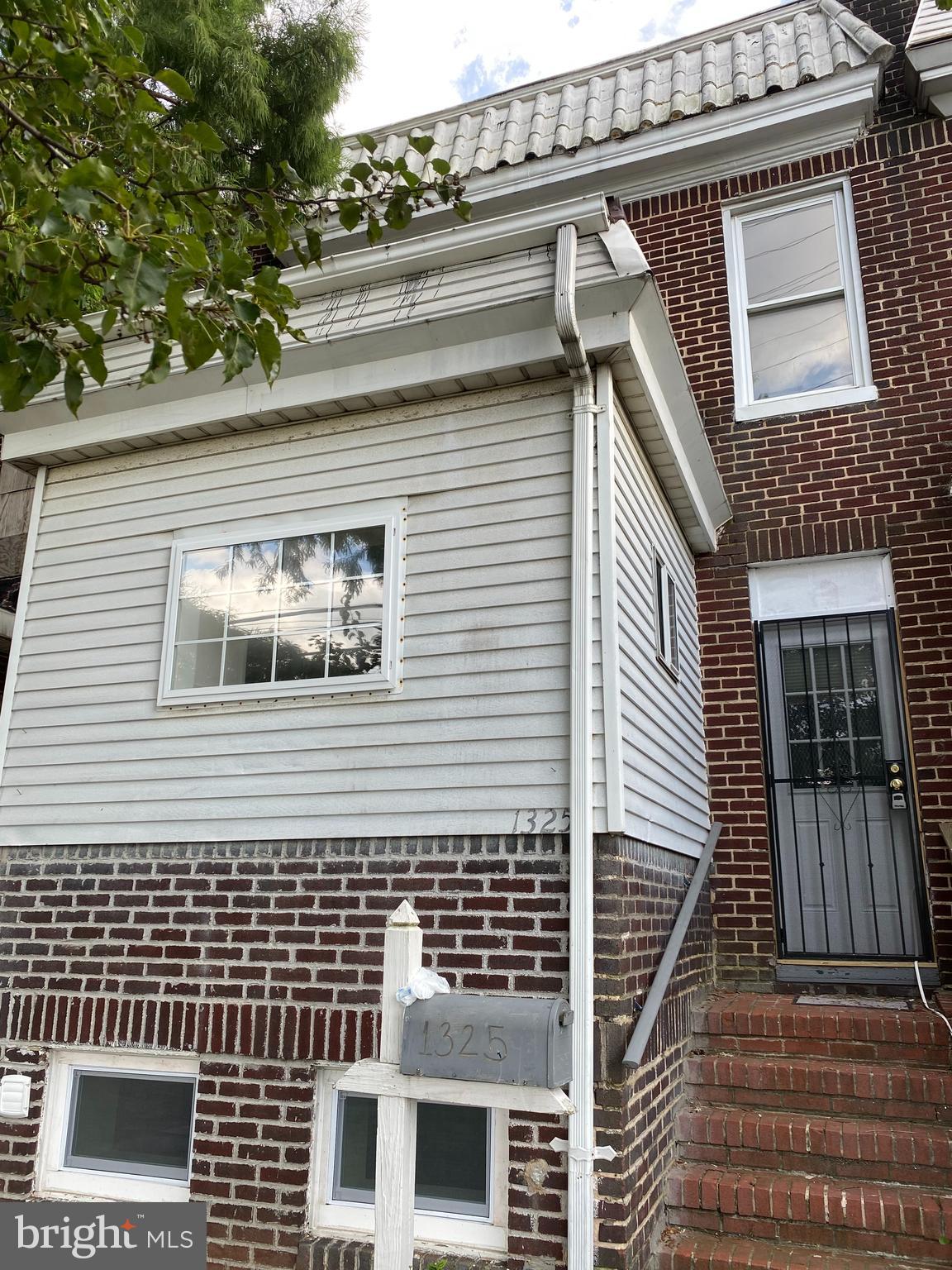 newly fully rehabbed townhouse with wood floor. new kitchen with cherry cabinets and granite kitchen counter top, 4 br 1 den 2 full bath and finished walk out basement with one car garage... washer and dryer and central air...rear deck off kitchen...