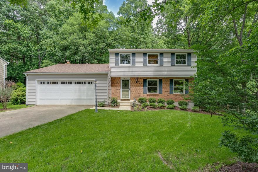 Deadline Monday 5PM. Join us for an open house on Sunday, June 9th, from 1-3 pm. Charming colonial home in the highly desirable community of Reston and sited on a private 0.42 acre lot. This home features 3 bedrooms, 3.5 bathrooms, and 2,352 square feet with an abundance of natural light and charm. The main level boasts an office/library, hardwood flooring throughout, a half bath, recessed lighting, and thoughtful, modern updates. The foyer leads to spacious, formal living and dining rooms. Gourmet kitchen with center island cooktop, white cabinets, stainless steel appliances, and multiple bar-top seating options! Family room with a gas log fireplace and easy access to the naturally lit sunroom. Upper level owner's suite with French doors, features a walk-in closet and leads to an en suite bathroom. Two additional bedrooms and one full bathroom complete the upper level. Finished basement with a laundry room, plenty of storage, and tons of potential to make it your own gym, movie theater, or playroom. Outdoors features a large two-tiered deck, brick walkways, a pond, and a fire pit, great for watching the wildlife in the trees. Close to shops and restaurants.  Dogwood, Hughes, and South Lakes Pyramid.