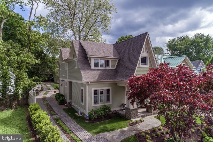 Pristine arts & crafts home situated on the coveted Eastport peninsula.  This home sits on a beautifully landscaped lot just across from Spa Creek.  The large, open interior design offers 9  coffered ceilings, custom wainscoting and crown molding throughout, gorgeous wide-planked hardwood floors, built-in cabinetry & bookshelves, custom plantation shutters a gas fireplace with custom built mantel and lovely screened porch with vaulted ceiling.  The gourmet chef s kitchen boasts custom cabinetry, Silestone countertops, a Wolf 6-burner dual-fuel range, Sub-Zero refrigerator, a built-in Advantium microwave/convection oven, GE Monogram wall oven, butler s pantry and wet bar with a wine fridge.  The spacious master bedroom leads to the en-suite master bath complete with heated floors, 2 vanities, an oversized river-rock shower, 2 walk-in closets and a dressing area.  The serene backyard oasis features a pergola and large patio, perfect for entertaining.  Paver driveway leads to a detached 2-car garage.  Walk or take a water taxi to shopping or dining in downtown Annapolis or drop your kayak or paddle board into Spa Creek.