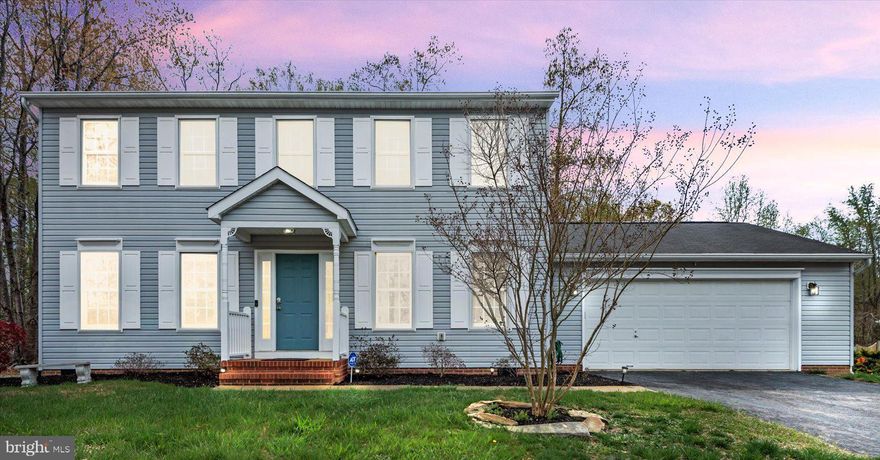 Veterans, If you’ve been looking for a 3.75% Assumable Mortgage Rate, this is it! Check out this beautiful Colonial home, which offers nearly 2,000 square feet of living space ​and ample room for comfort and relaxation. ​​The well-equipped kitchen features​ a center island, stainless steel appliances​, and granite countertops. The kitchen overlooks the family room, creating a perfect setting.  A powder room and spacious living and dining rooms are on the main level. Upstairs, you will find three generously sized bedrooms alongside a hall bathroom. The owner's bedroom includes an ensuite bathroom with two vanities, a separate shower​, and a garden tub. A new HVAC unit has recently been installed. The backyard​, a true haven, boast​s a spacious, level, fenced area and deck, offering privacy. Conveniently located on a cul de sac street and minutes to shopping, schools, 195, Quantico, and the VRE. Make this house your home today!