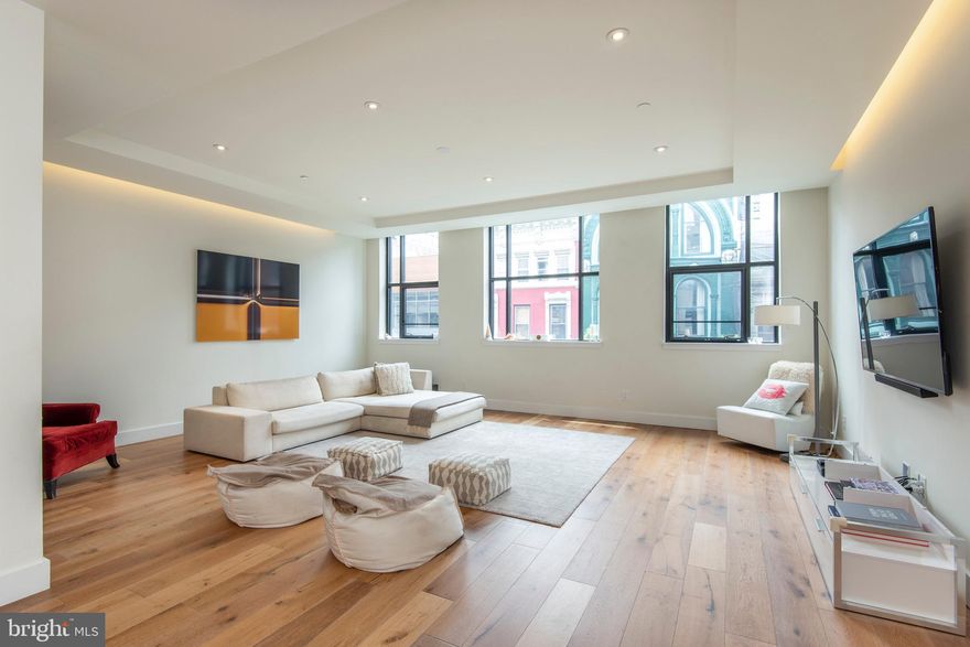 A show-stopping 3,500+ square foot, full-floor, single-level residence in the heart of Center City Philadelphia, featuring private elevator access and exceptionally low condominium fees of $805 per month, approximately $0.23 per square foot, a rare offering for a luxury building of this scale.

Located at 725 Chestnut Street, Unit 2,  this full-floor condominium offers over 3,500 square feet on a single level, positioned just 0.2 miles from Washington Square. The residence delivers privacy, scale, and uninterrupted flow, with direct elevator access into the home.

The interior features an expansive open floor plan with LED lighting, wide-plank flooring, and ceiling heights exceeding nine feet. The kitchen is equipped with Wolf and Sub-Zero appliances, Grohe and Kohler fixtures, and generous storage, designed for daily use and entertaining. Three bedrooms each include an ensuite bath, complemented by a separate powder room.

Building features include a private elevator with fingerprint access, intercom system, shared storage, and in-building laundry. The location places the residence near cultural and dining destinations including Morimoto, Zahav, Buddakan, and Talula’s Garden, along with galleries, theaters, and historic sites throughout Center City.

Nearby attractions include Independence Hall, Independence National Historical Park, and the Avenue of the Arts corridor. Transportation access includes proximity to 30th Street Station and Interstate 95. 

A rare single-level, full-floor offering combining historic surroundings with modern construction and efficient city access.  Seller is offering 2 years of pre-paid parking at a nearby lot or garage just steps away from your front door.