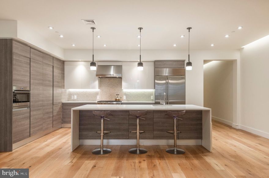 A show-stopping 3,500+ square foot, full-floor, single-level residence in the heart of Center City Philadelphia, featuring private elevator access and exceptionally low condominium fees of $805 per month, approximately $0.23 per square foot, a rare offering for a luxury building of this scale.

Located at 725 Chestnut Street, Unit 2,  this full-floor condominium offers over 3,500 square feet on a single level, positioned just 0.2 miles from Washington Square. The residence delivers privacy, scale, and uninterrupted flow, with direct elevator access into the home.

The interior features an expansive open floor plan with LED lighting, wide-plank flooring, and ceiling heights exceeding nine feet. The kitchen is equipped with Wolf and Sub-Zero appliances, Grohe and Kohler fixtures, and generous storage, designed for daily use and entertaining. Three bedrooms each include an ensuite bath, complemented by a separate powder room.

Building features include a private elevator with fingerprint access, intercom system, shared storage, and in-building laundry. The location places the residence near cultural and dining destinations including Morimoto, Zahav, Buddakan, and Talula’s Garden, along with galleries, theaters, and historic sites throughout Center City.

Nearby attractions include Independence Hall, Independence National Historical Park, and the Avenue of the Arts corridor. Transportation access includes proximity to 30th Street Station and Interstate 95. 

A rare single-level, full-floor offering combining historic surroundings with modern construction and efficient city access.  Seller is offering 2 years of pre-paid parking at a nearby lot or garage just steps away from your front door.