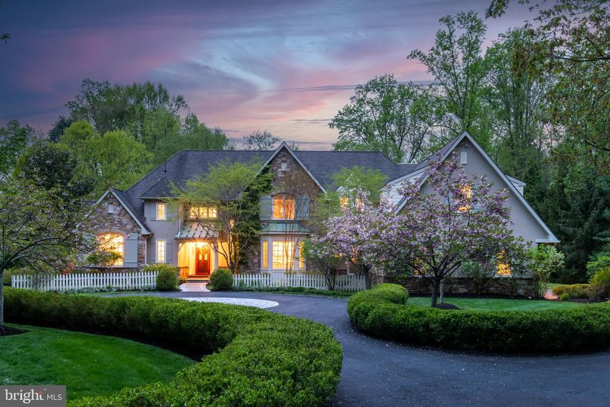 Prepare to fall in love with this exquisite collection of architecture, design, manicured landscape and outdoor spaces set on a level secluded 1.34  acre  homesite in coveted Lower Gwynedd. This charming estate home was brought to life under the artful direction of renowned architect Rene Hoffman and hand crafted by Gwynedd Custom Builders and is ready to pass along to the most discerning and sophisticated buyer. This home represents a perfect and harmonious blend of classic timeless finishes, sophistication and comfort. The end result is a property that presents in mint condition and offers turn key living like no other. Enter this fine residence through a gated and boxwood lined circular driveway. The property encompasses the main home, formal and informal gardens, blue stone patios, covered porches, pergolas, Koi Pond and enchanting cottage like outbuilding/shed that can be used for numerous purposes. Hallmarks include: Two story entry foyer with turned staircase, site finished hardwoods, Stunning main floor primary retreat with the epitome of closets and luxurious bath, remarkable millwork and built-ins, inviting fireplaces, volume ceilings, plantation shutters, solid doors, central vac, front and back staircases, generator, walk up attic and unfinished attic space on second floor just to name a few. The Great Room offers a raised hearth wood burning stone floor to ceiling fireplace surrounded by custom built-ins and popular wet bar with Sub Zero drawers, wine chiller and french doors to patio. The primary suite with doors to patio and hot tub is complemented by tray ceiling, marble surround gas fireplace, built-ins and as noted the epitome of closets with library ladder, vanity area, exquisite lighting, custom doors and inset drawers from Village Handcrafted Cabinetry, the primary spa like bath in marble  offers separate floor to ceiling custom vanities. Every detail has been custom designed and curated with many enhancements during this homeowners stewardship. The chef's kitchen is a delight with professional grade appliances from Wolf and Sub Zero, warming drawer and pot filler, large center island, loads of counter space and custom tile grotto area. Savor the experience from the glassed dining area with access to patio and covered outdoor dining includes a stone chimney BBQ grilling area with stainless steel cabinets and natural stone tops, once again showcasing the seamless and uncompromised integration of indoor and outdoor living spaces that this home offers. The Living Room with bay window is vast and sophisticated the current owners thoroughly enjoy the two main floor living spaces, the flexible plan will allow for numerous ways to use this fabulous space. The main floor is complimented by a stunning formal powder room and towards the back of the home a new/updated full bath on the main level, a well equipped laundry room, mudroom with pantry area , command center, family sized built-ins / cubbies and access to the oversized 3 car side entry garage. Ascend either the back or front staircase to 4 generous sized bedrooms, the blue room with ensuite bath feels like a primary bedroom, there are an additional two bedrooms greatly sized with updated J&J bath. The  fourth bedroom suite offers two rooms and full ensuite bath it is closest to the back staircase and is currently used as an upper floor den and study the options here are endless if you are looking for an in-law, au-pair suite or a great place for out of town guests, this will work out perfectly. This right sized cottage style home is full of designer finishes, extraordinary indoor/outdoor living spaces, exceptional gardens, uncompromised privacy and curb appeal galore. Enjoy 
its close proximity to dining and shopping destinations in Ambler, top rated Wissahickon School District and a host of highly regarded private schools. Easy commute to C.C. with nearby rail service out of  Ambler. Must be seen to be appreciated and awaits just 1 Lucky Home Buyer!