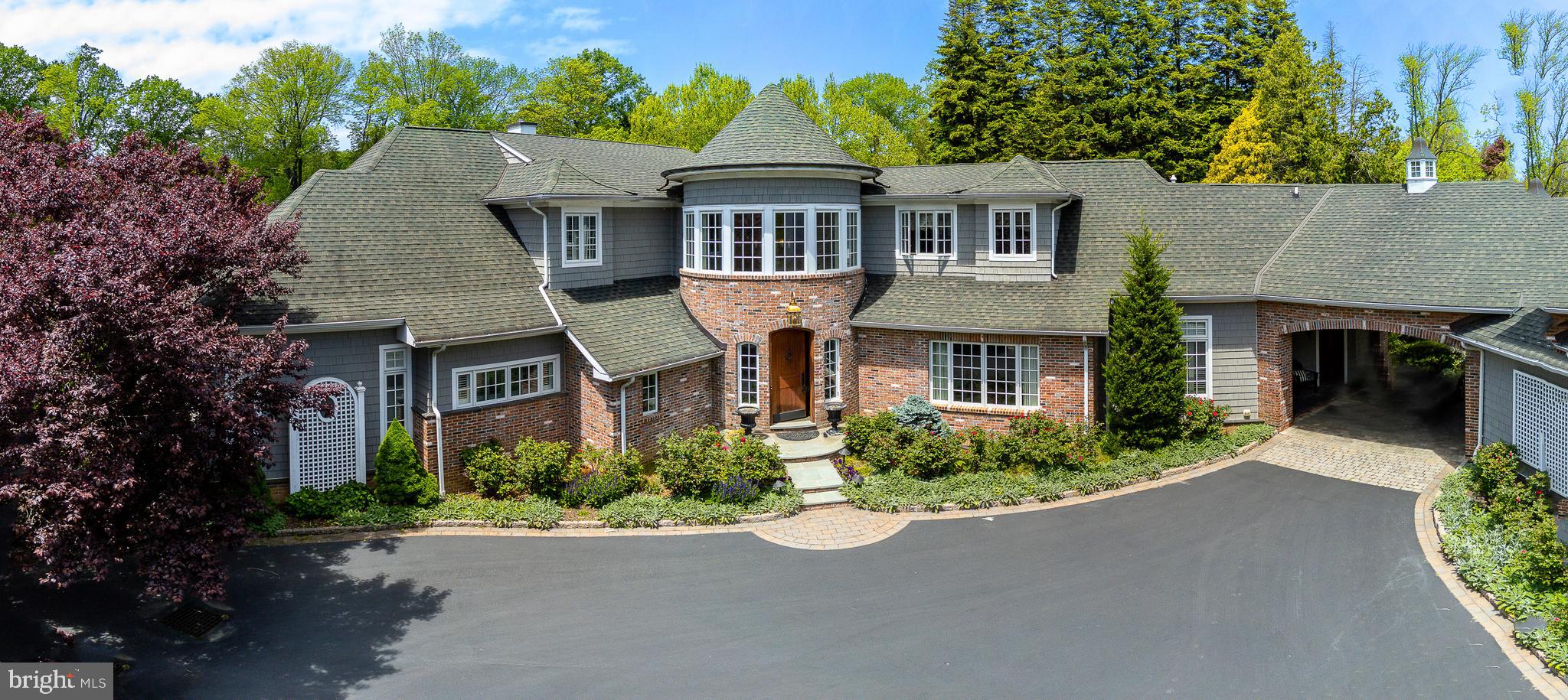 Welcome to this fabulous Estate home; a gorgeous 5,417 sq. ft. 4 Bedroom, 5.1 Bathroom main house with a separate 2 Bedroom, 2 Bath Guest House. This custom built home enjoys a spectacular 2.14 acre lot with mature landscaping, views of Mill Dam and ultimate privacy. Featuring unparalleled craftsmanship and impeccable quality with an open floor plan concept, there is traditional elegance through-out. Outstanding features include a gracious and welcoming 2-story circular Foyer with a sweeping turned staircase, a gallery hallway with rich hardwood floors, custom full height wainscot, arches and pillars adorn the sunken formal Living Room and Dining Room. Both rooms feature French doors which lead out to a beautiful Terrace with built in grill, awning, and abundant space to entertain, relax, and take in the fantastic views of the private back yard. Back indoors, arched doorways from the Dining Room lead you through the Butler s pantry and into the large Gourmet Kitchen featuring full-height antique white cabinetry, under cabinet lighting, granite counter tops, and an undermount farm sink. The oversized center island with cherry base cabinets and granite counter top offers ample prep space for the discerning chef. Top of the line appliances and two walk-in pantries with custom cabinetry make this kitchen complete. The Kitchen is open to the Family Room with gas fireplace, French Doors to side patio and Morning/Breakfast Room which make for intimate family gatherings. This wing is completed by a Mud Room, Laundry Room, staircase to basement, and a rear door to the second outdoor patio. The first floor Master Bedroom Suite has everything; hardwood flooring, crown molding, ceiling fan, sitting room, custom built-in cabinets, two double door closets, walk-in closet, plantation shutters, built in sound system, luxurious en suite luxurious spa-like Master Bath with jetted tub, large tiled shower, his and her sinks and private water closet, an additional Powder Room, second Laundry closet.A sweeping staircase guides you to the second level across hardwood floors to 3 additional bedrooms with en suite baths, a spacious Hobby Room/Family/TV Room/Den with Built-in day bed with windows and storage. Other special features include extensive custom millwork throughout, an in home sound system, and a the separate Guest House also features, Family Room, Breakfast Nook, Kitchen, and beautiful Sun Room with access to the yard. This fabulous, walk to Wayne location is superb, convenient to major highways, upscale shopping boutiques, sophisticated dining, and your choice of fine schools. It offers an EZ commute to Center City Philadelphia and the Philadelphia International Airport, and is in close proximity to many renowned private schools. We are accepting in-person showings of this property. Please note that you must call to schedule a showing and we will be following all the PA State Real Estate Guidelines and Protocols for COVID-19. Please note that Delaware County is conducting a real estate tax reassessment, effective January 1, 2021. If you have any questions or concerns about the impact of this process on the future real estate taxes for this property, you should contact the Delaware County Treasurer's Office or call the Tax Reassessment Hotline at 610-891-5695