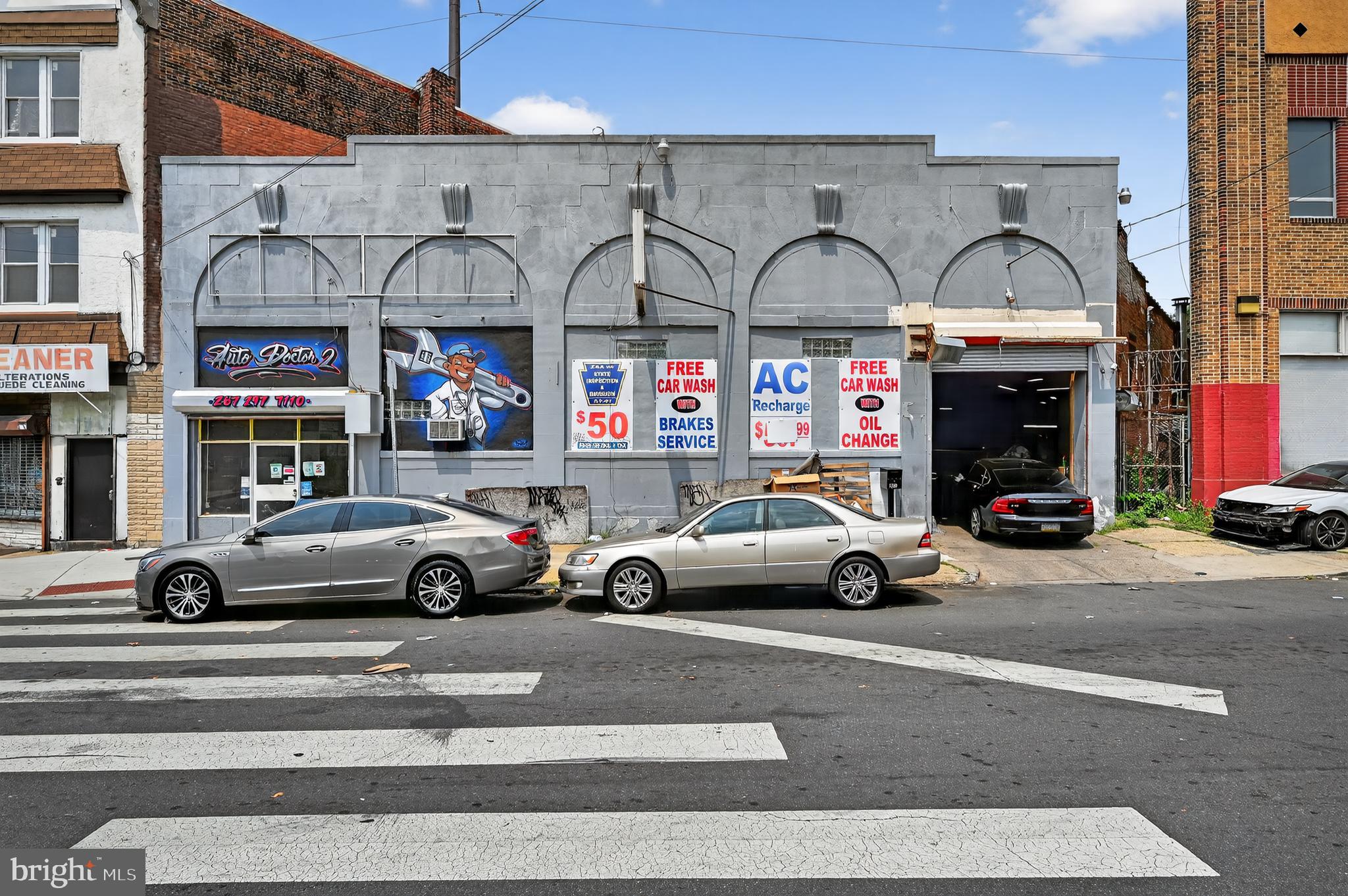 Prime Auto Body Shop Investment Opportunity - Exceptional turnkey investment property featuring an established auto body shop with a reliable fifteen-year tenant already in place, ensuring immediate cash flow from day one. The lease goes through 2027. This well-positioned Philadelphia location offers excellent visibility and accessibility for automotive services, with the existing tenant maintaining strong community ties and steady business operations. The property includes all infrastructure for professional auto body work. With lease terms secured through the next two years, this represents an ideal hands-off investment for those seeking stable rental income in Philadelphia's robust automotive service market. The established tenant relationship eliminates vacancy concerns while providing potential for lease renewal and long-term appreciation in this desirable commercial corridor.