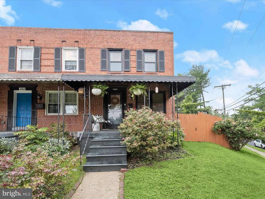 Welcome to this charming brick end-unit townhome in the Medfield community!  A spacious front porch sets the tone for this beautifully updated home, where you’ll find warm hardwood floors, recessed lighting, and shiplap accents creating a cozy yet modern aesthetic. The living room flows seamlessly into the dining room, accented with chair rail molding and a neutral color palette that complements the natural light throughout. The kitchen is a chef’s delight, featuring concrete countertops, open shelving, subway tile backsplash, a farmhouse sink, a rolling island, and stainless steel appliances, with direct access to a large fenced yard. Upstairs offers three bright bedrooms, each with hardwood floors and one with a stylish accent wall, plus a full hall bath with ceramic tile and generous storage. The partially finished lower level includes plush carpeting, recessed lighting, and a convenient powder room, perfect for a home office, guest area,  or a lounge. Outside, enjoy the expansive patio, deck, cowboy pool, and well-kept landscaping, an entertainer’s dream! Ideally located near shopping, dining, and entertainment of  Hampden, Cross Keys, and  The Avenue, Miracle on 34th Street lights, and easy access to I-695, I-95, and I-83 for commuting or exploring all that Baltimore offers. Updates: New Central A/C (2025), Updated Roof, Black Frame Windows.