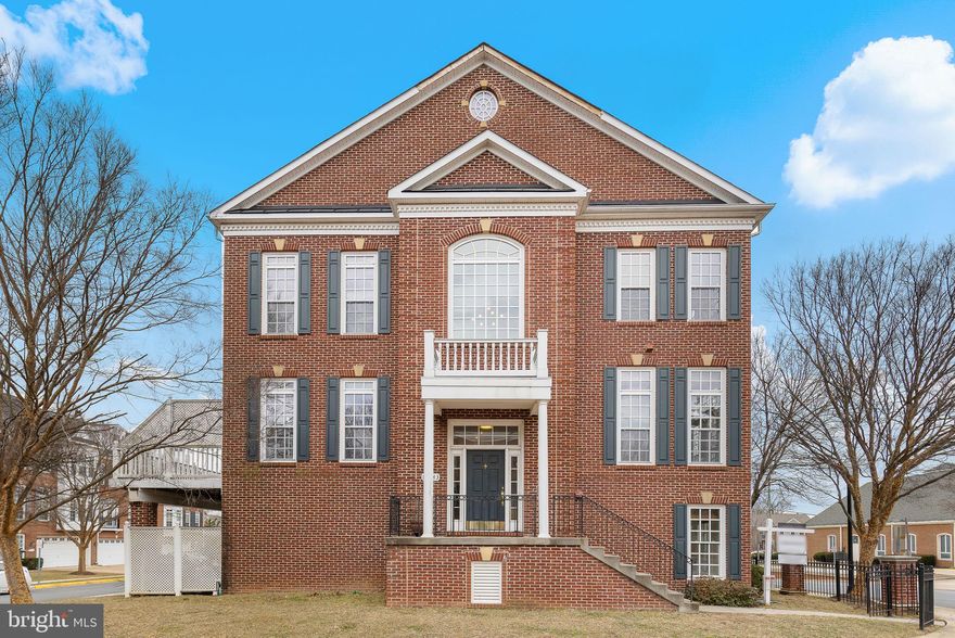Welcome to this exquisite all-brick, end-unit townhome, where timeless elegance meets modern convenience. Perfectly positioned just minutes from GMU and the vibrant heart of downtown Fairfax City, this exceptional residence offers a harmonious blend of sophistication and comfort. Step inside to discover gleaming hardwood floors, soaring ceilings, and an abundance of natural light that fills every corner of the main level. The gourmet kitchen is a true masterpiece, featuring rich wood cabinetry, an expansive center island, gleaming granite countertops, double wall ovens, and stainless steel appliances. Whether you’re hosting an intimate gathering or savoring a peaceful morning coffee, the charming breakfast nook and rear deck provide the perfect setting. Upstairs, the luxurious primary suite serves as a private sanctuary, complete with a spacious walk-in closet and a spa-inspired ensuite bath, featuring a soaking tub, a glass-enclosed shower, and dual sinks. Two additional generously sized bedrooms, a second full bath, and a thoughtfully designed laundry room with custom cabinetry and a utility sink complete this level. The lower level offers even more versatility, with a private bedroom and full bath—ideal for guests, home office or bonus room. This level also provides seamless access to the oversized two-car garage. With its refined finishes and unparalleled location, this remarkable home is the perfect blend of luxury, style, and convenience in the heart of Fairfax City.  Additional Updates: Fresh Paint, updated light fixtures, new carpet and new hot water heater - 2025.  OFFER DEADLINE MONDAY, 3/3 @ NOON. Seller reserves the right to accept an offer prior to the deadline.